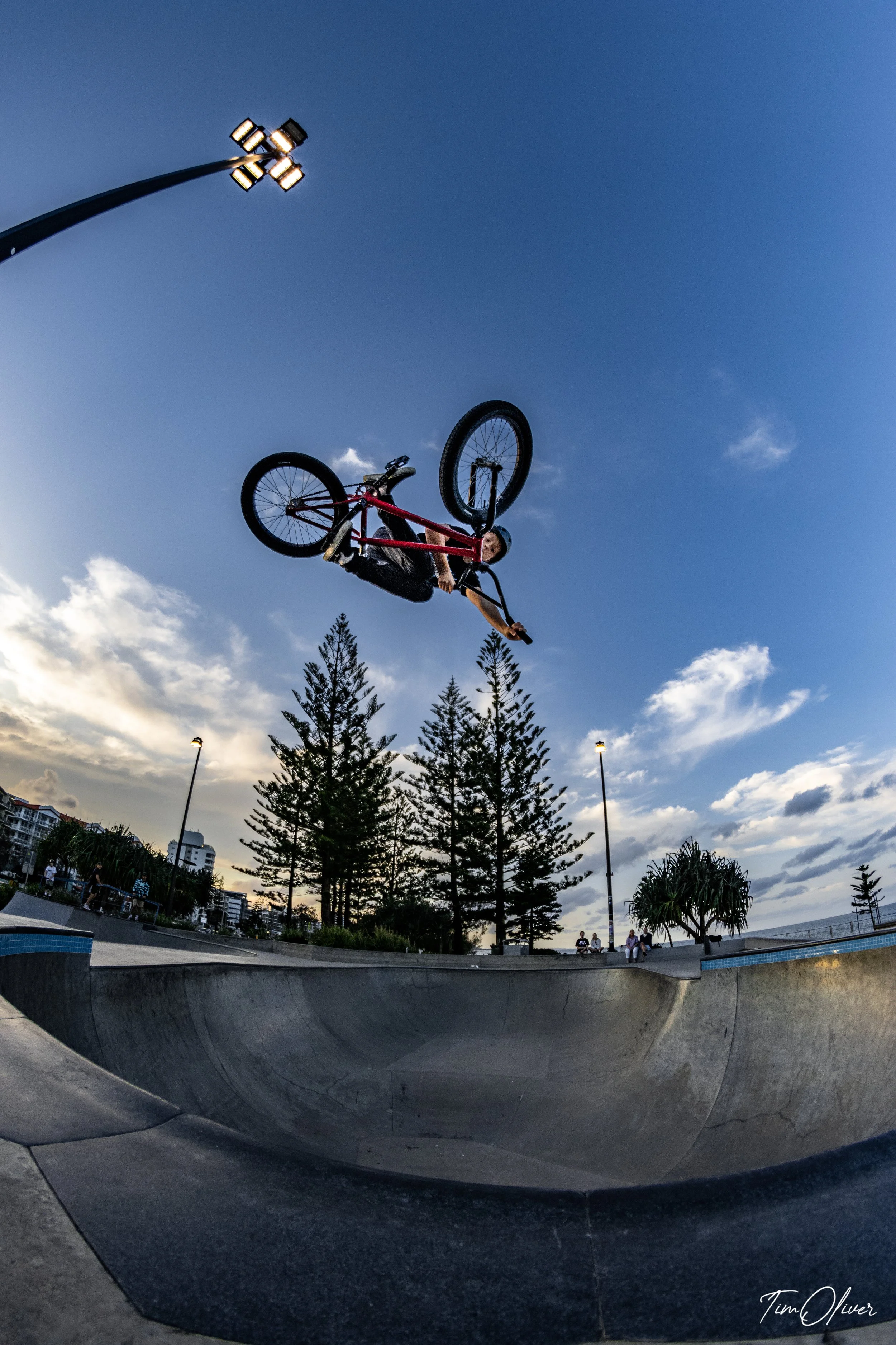 Jaxon Philp boosting an air at Alexandra Headland skatepark