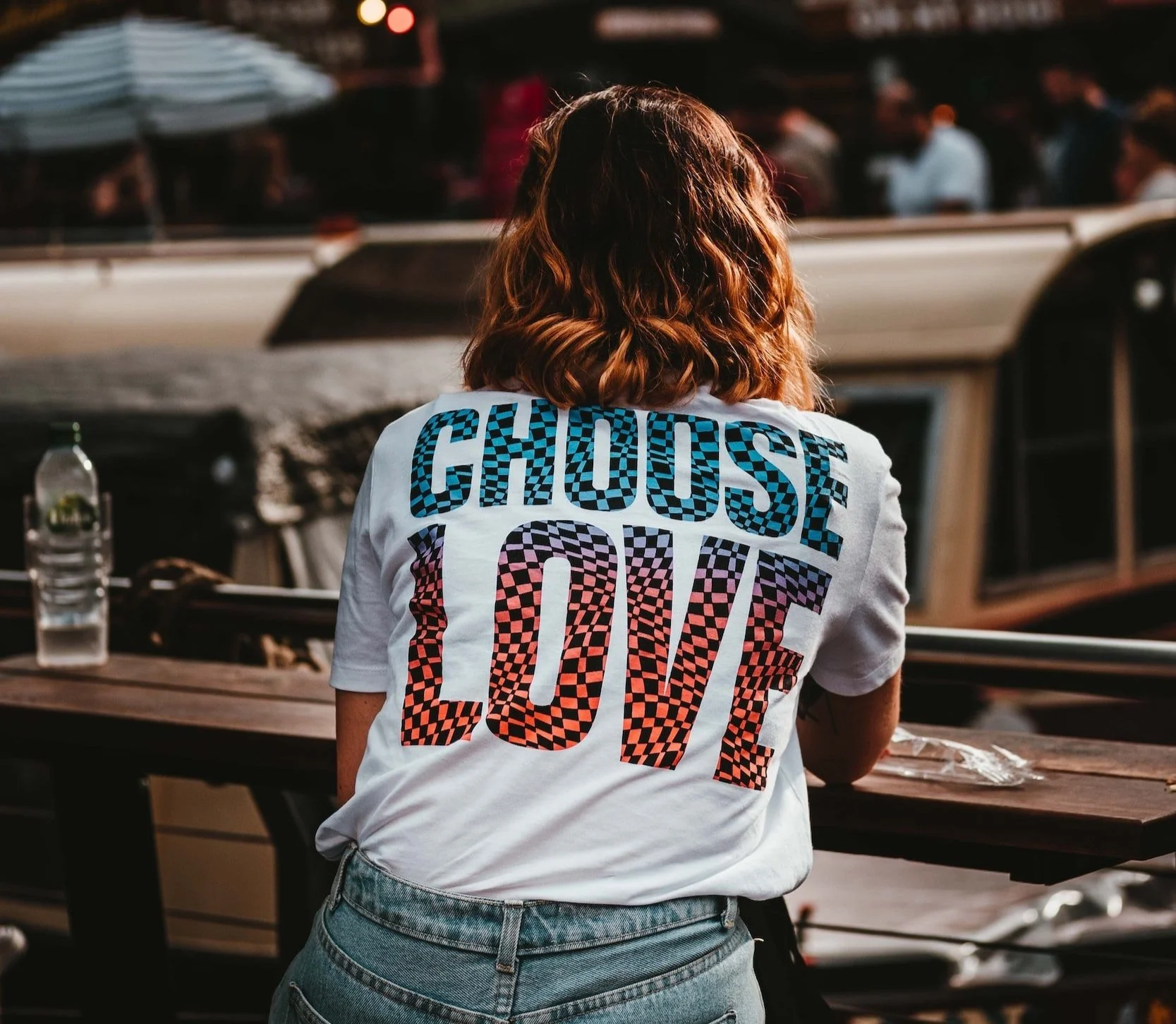 full colour 'choose love' print on a white t-shirt