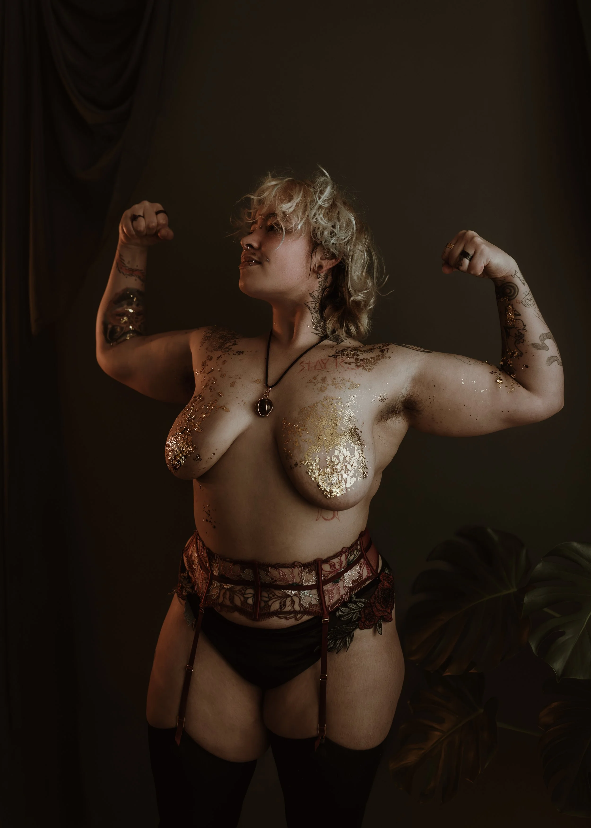 Luxury trans boudoir photography portrait of Orion at Marieke Captures studio in Glasgow, Scotland, celebrating queer identity and self-expression during transition