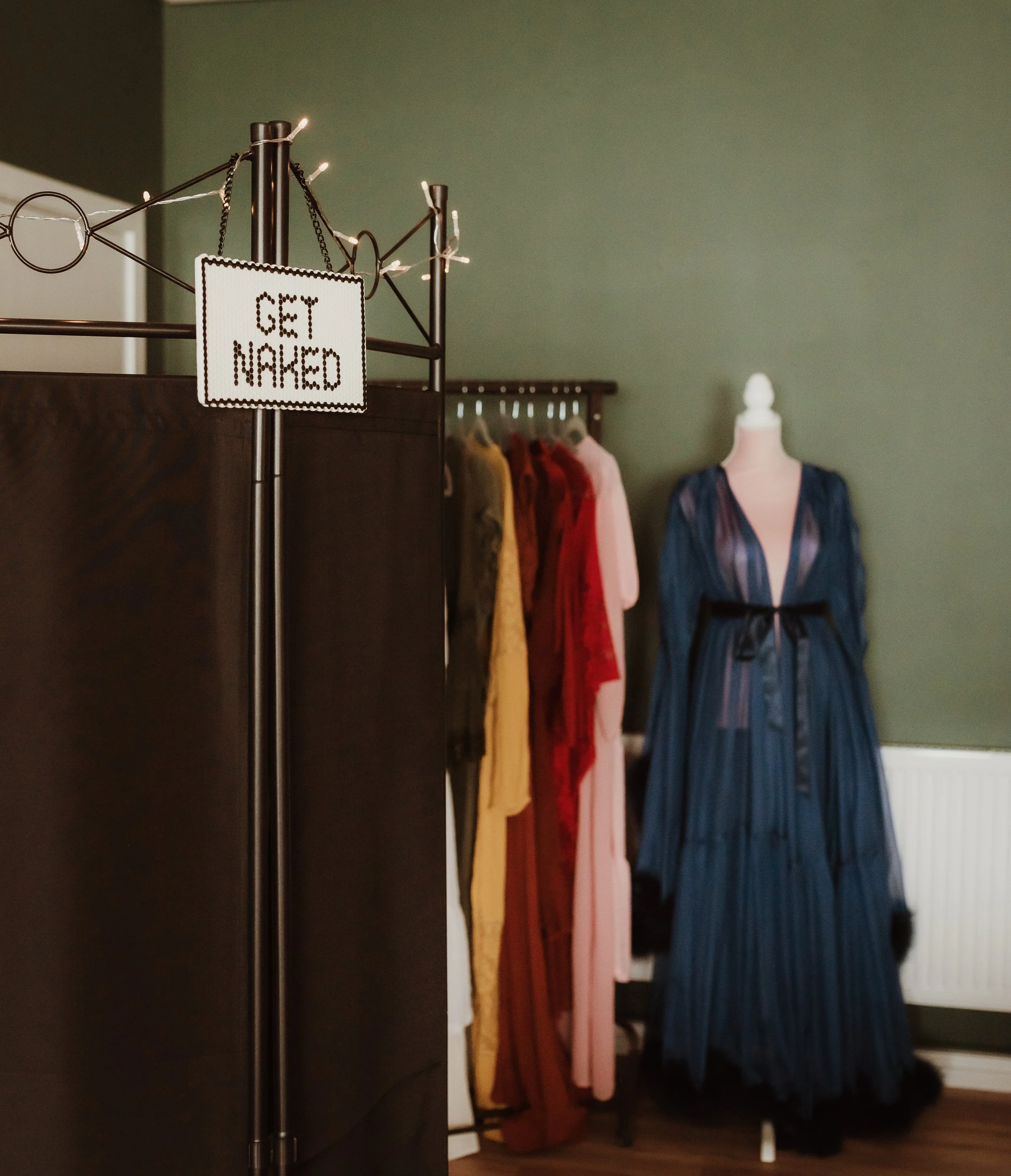 Private boudoir studio Glasgow — warm lighting and green tones