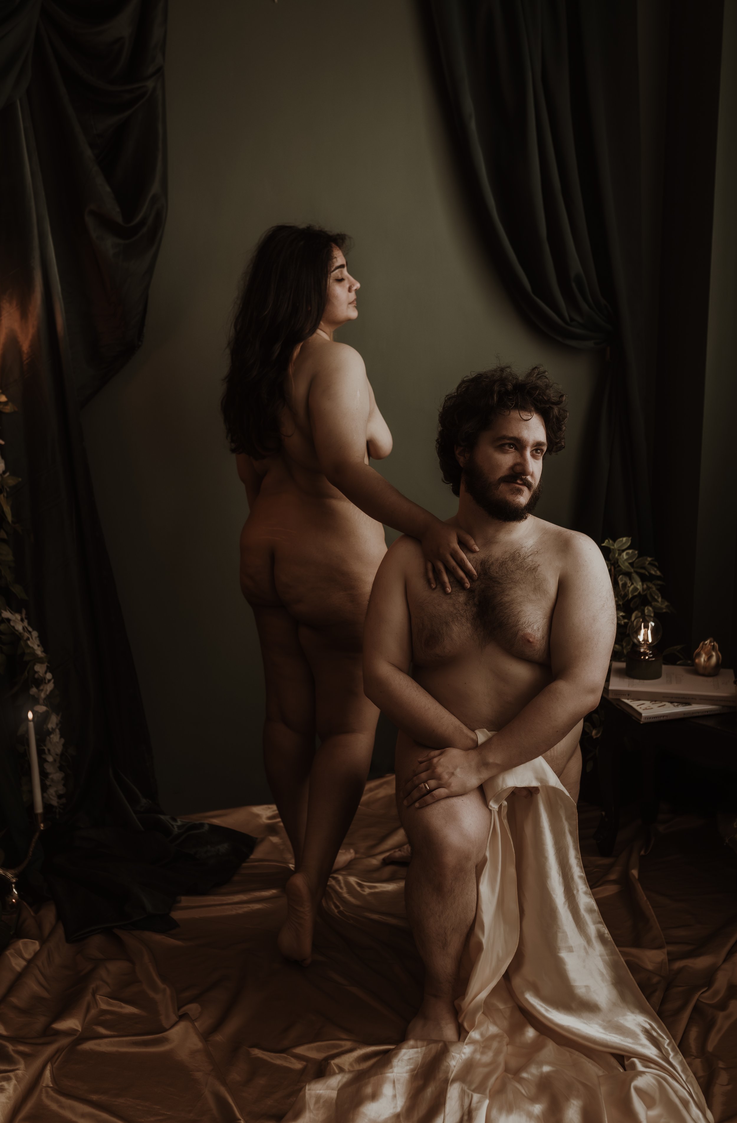 A couple photographed together in Marieke Captures' Glasgow studio — an intimate, candlelit couples boudoir portrait celebrating connection.