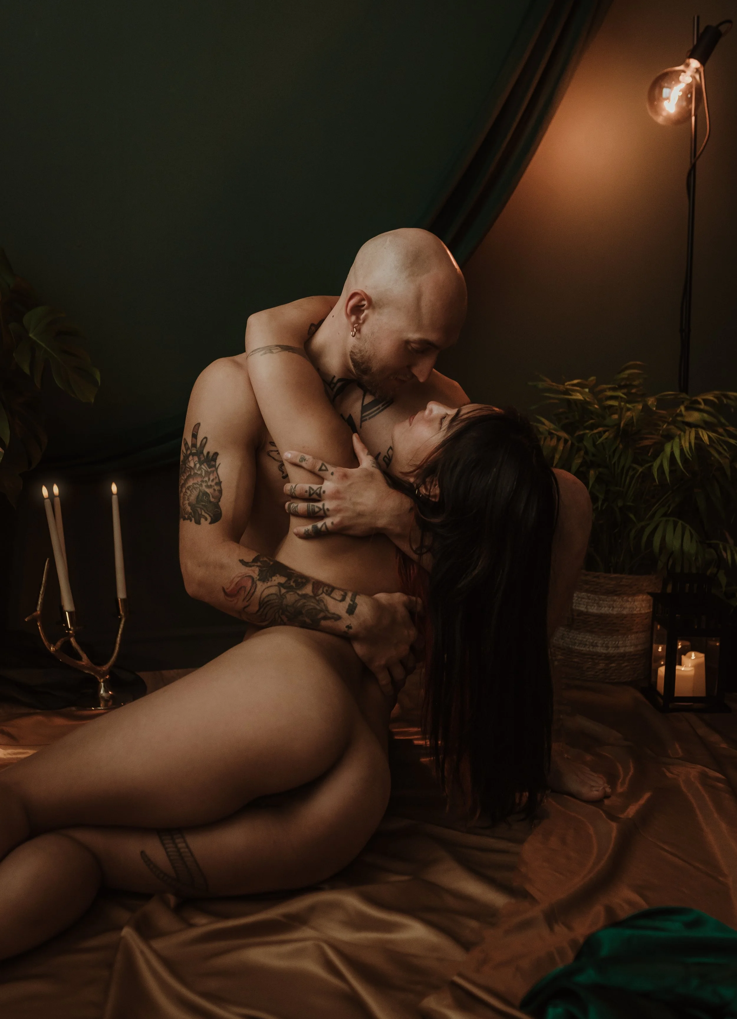 Romantic portrait of a couple sharing a soft glance during their couples boudoir photography experience at Marieke Captures studio, Glasgow