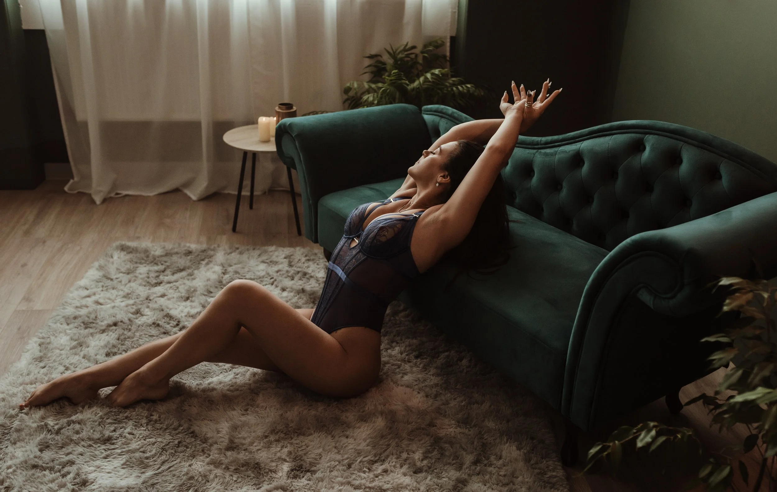 Woman in a lace lingerie bodysuit during a boudoir photoshoot at Marieke Captures studio in Glasgow — a versatile and flattering outfit option for any boudoir session