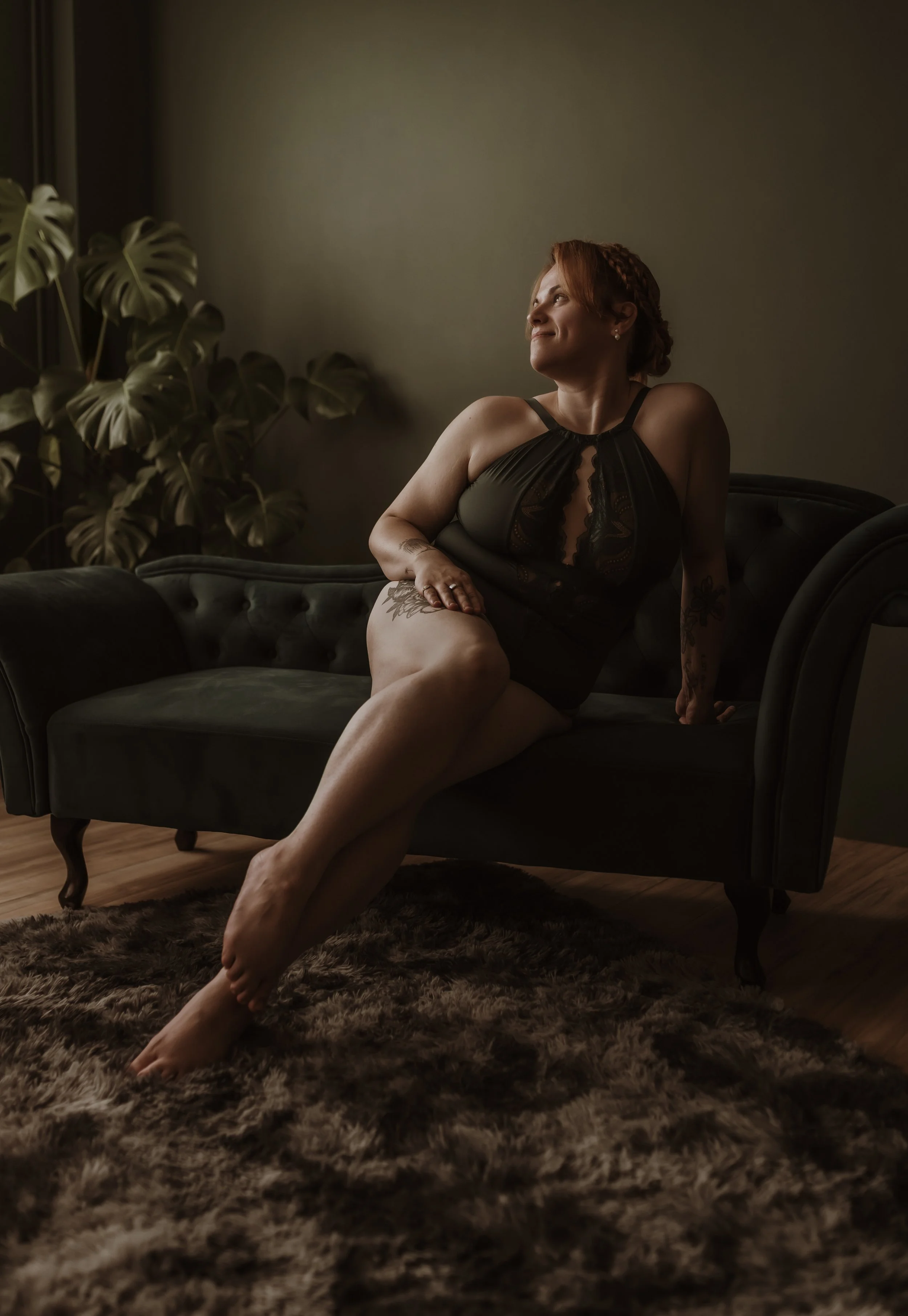 A client settling into a guided boudoir session at Marieke Captures studio in Glasgow, with natural window light and no rushing.