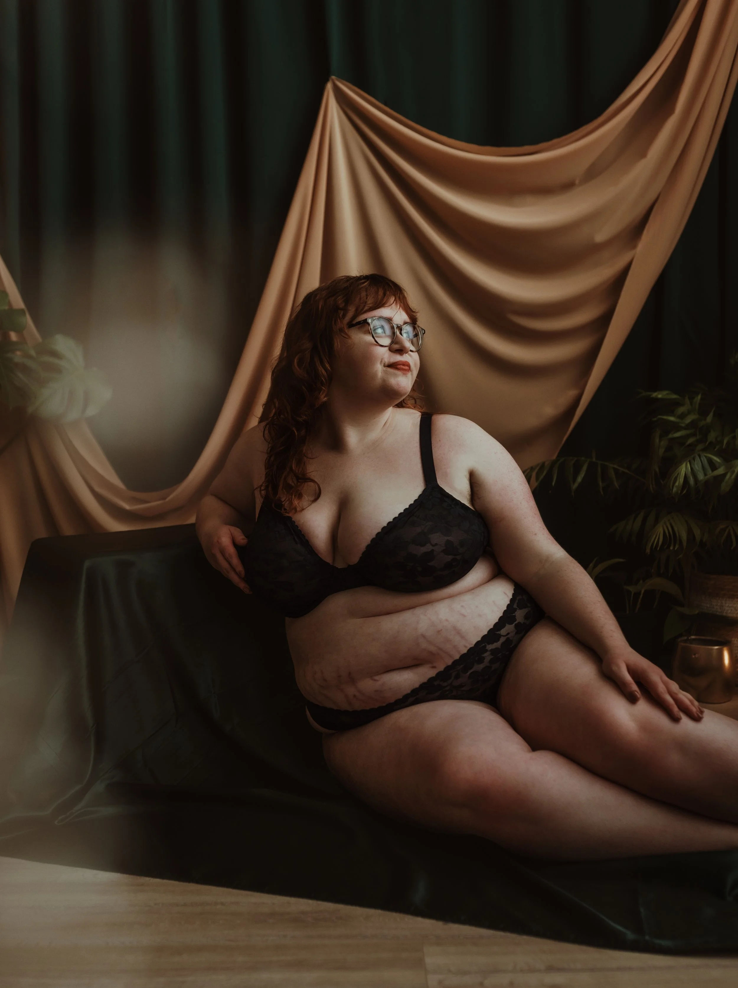 Woman in a powerful boudoir photography pose at Marieke Captures studio in Glasgow, Scotland — a moment of self-acceptance and inner healing through body confidence photography