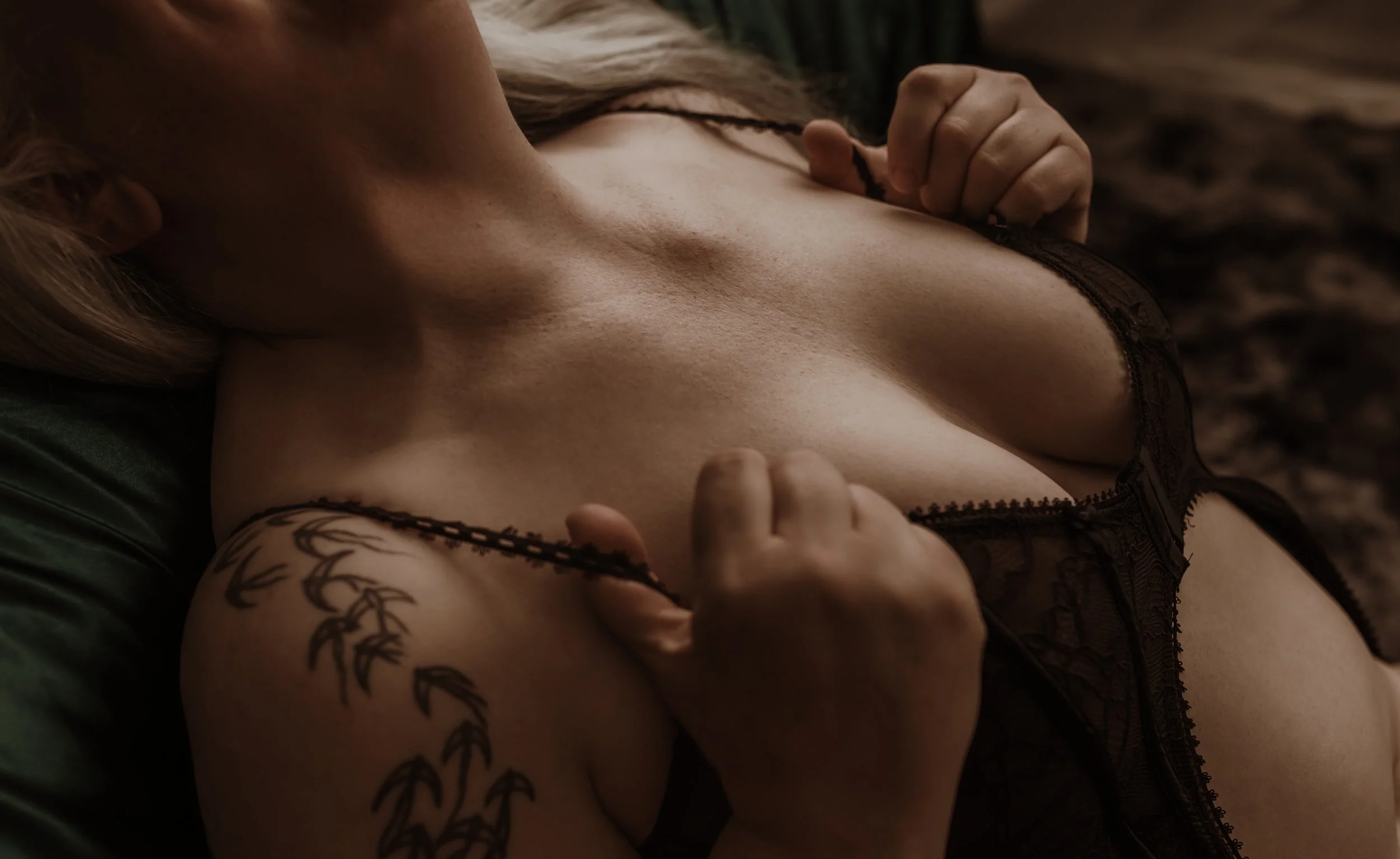 A close-up detail shot from a boudoir session with Marieke Captures, capturing the quiet, intimate side of the experience.