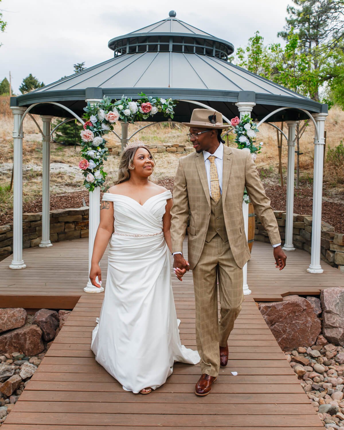 colorado-springs-wedding-photographer-bride-and-groom-walking.jpg