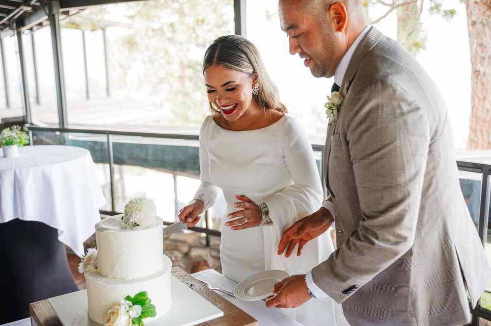 boulder-wedding-photography-bride-and-groom-cutting-cake.jpg