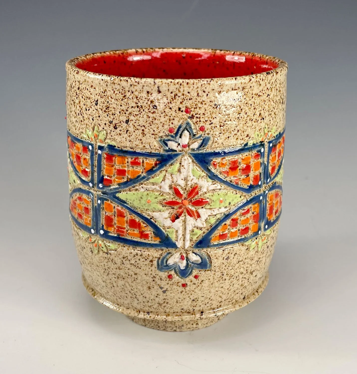 Carved stoneware tumbler