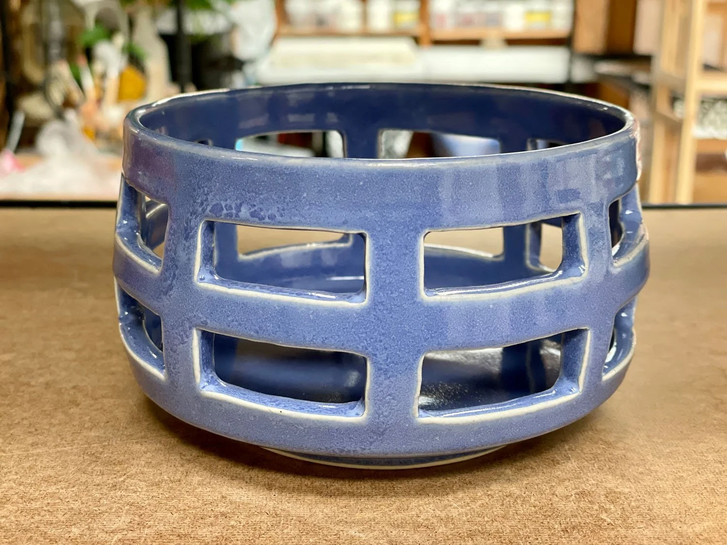 Daylight view of Blue cutout stoneware basket
