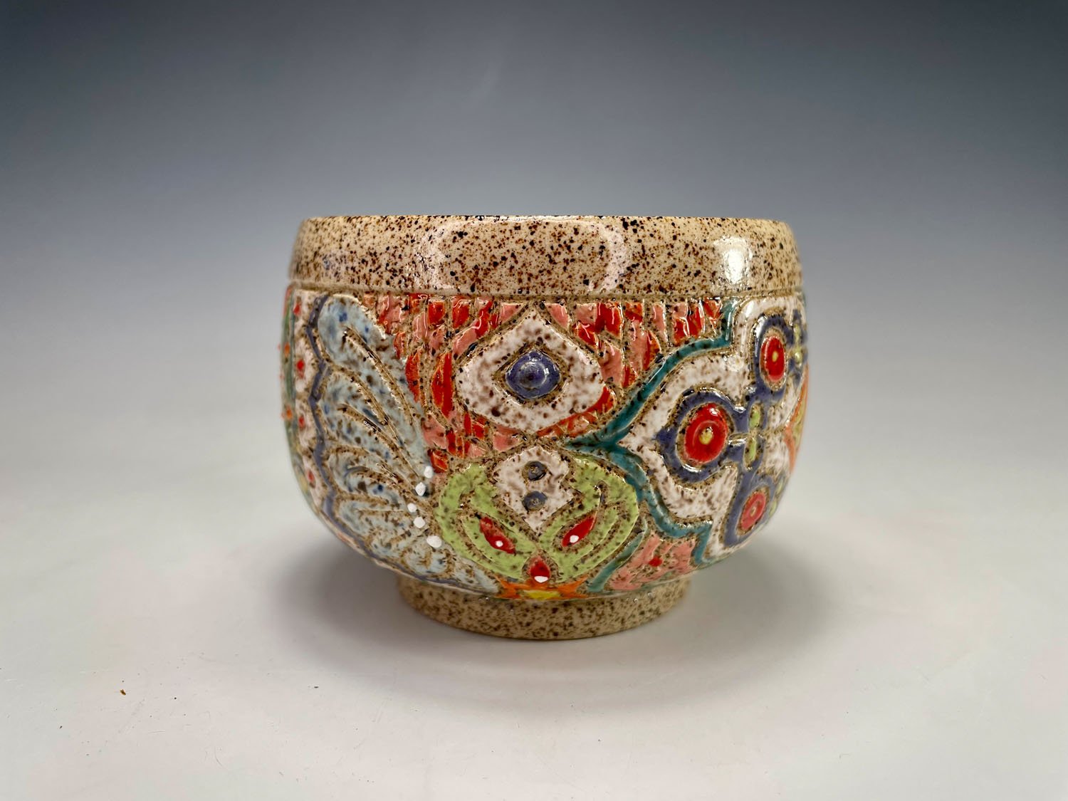 Section of design on freeform stoneware tea bowl
