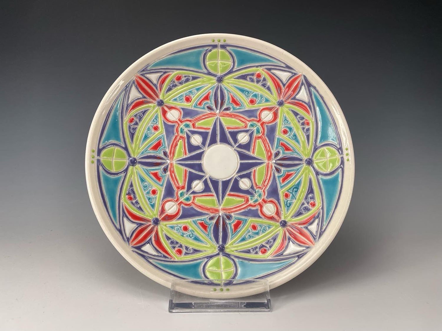 Colorful hand carved cosmic design porcelain bowl
