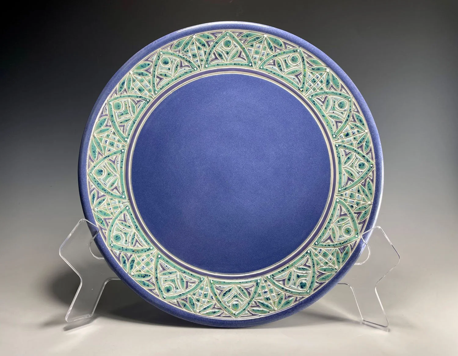 Hand carved blue porcelain platter plate with blue green design
