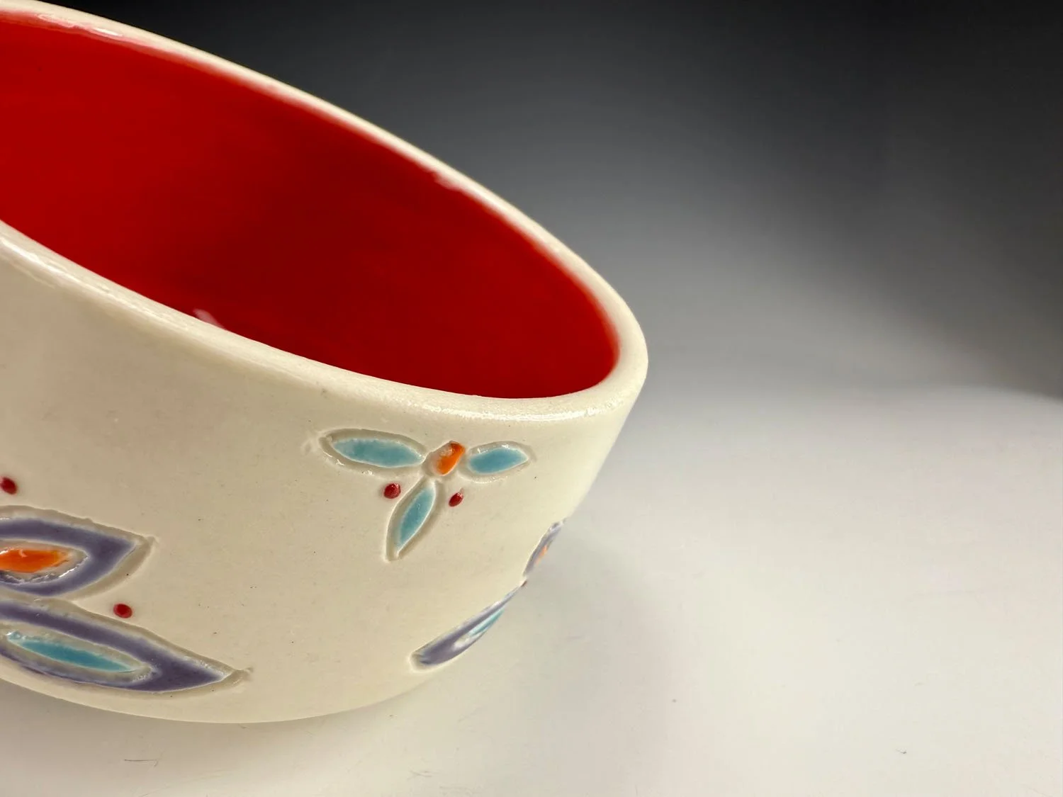 Interior red of Carved porcelain everything bowl