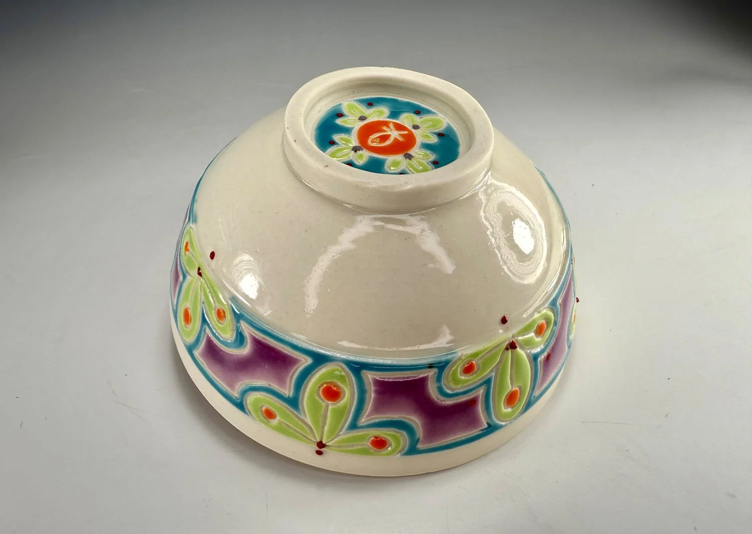 Bottom of bowl 2 Tangerine lined porcelain two bowl snack set with carved outer bands