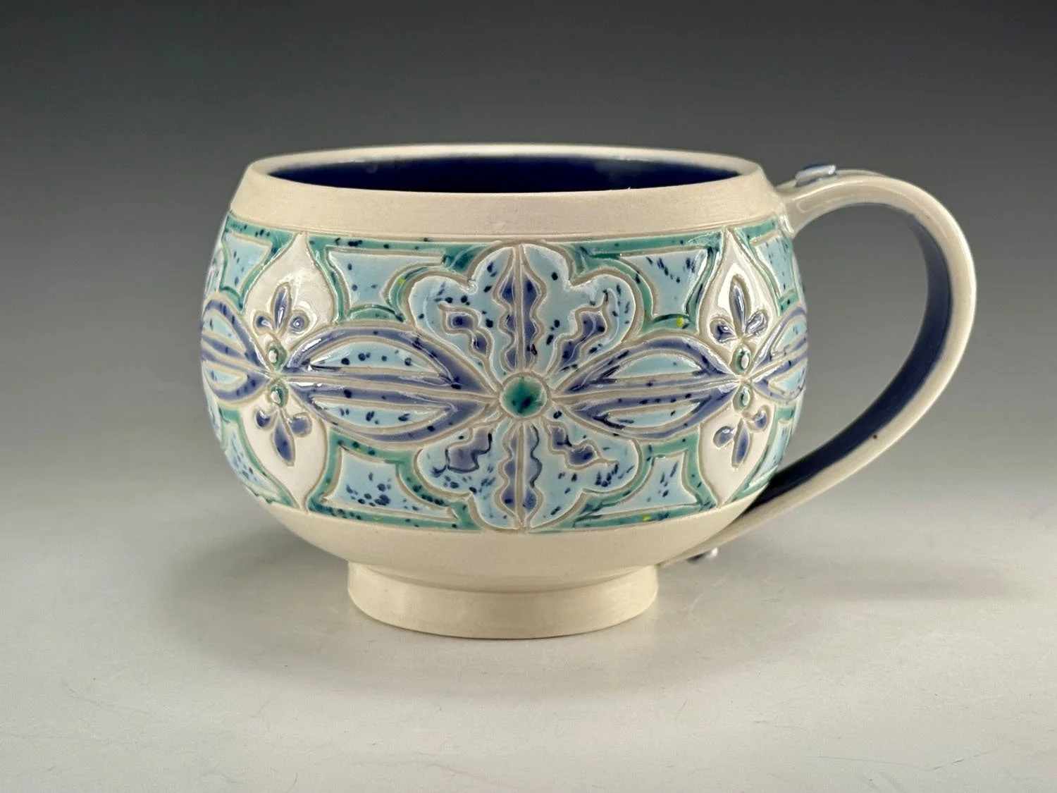 Carved Blue Green Porcelain Mug