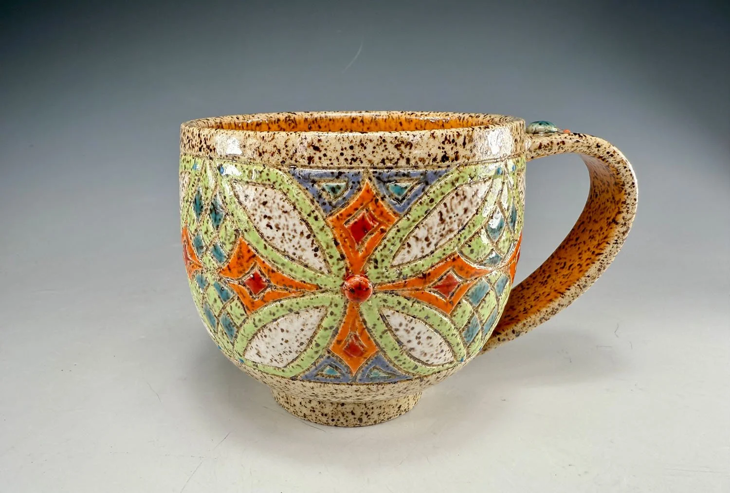 Four directions stoneware mug