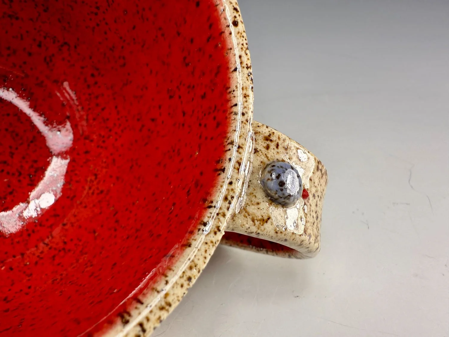 Interior view of Hand carved stoneware mug