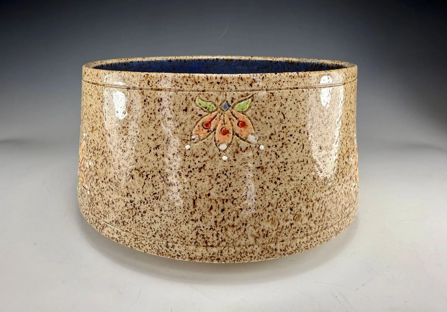 Side view of Thistle stoneware serving bowl
