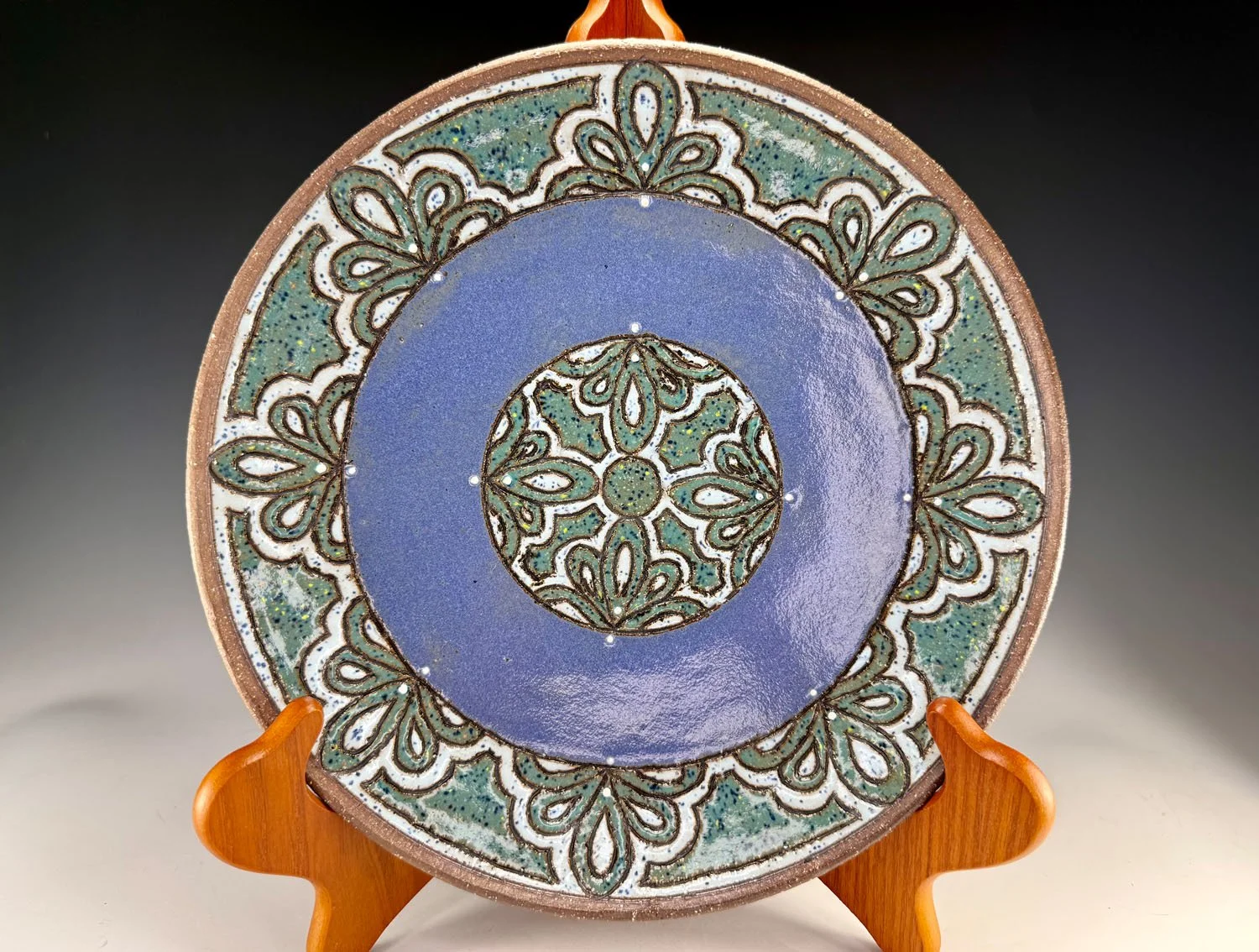 Carved stoneware plate bowl