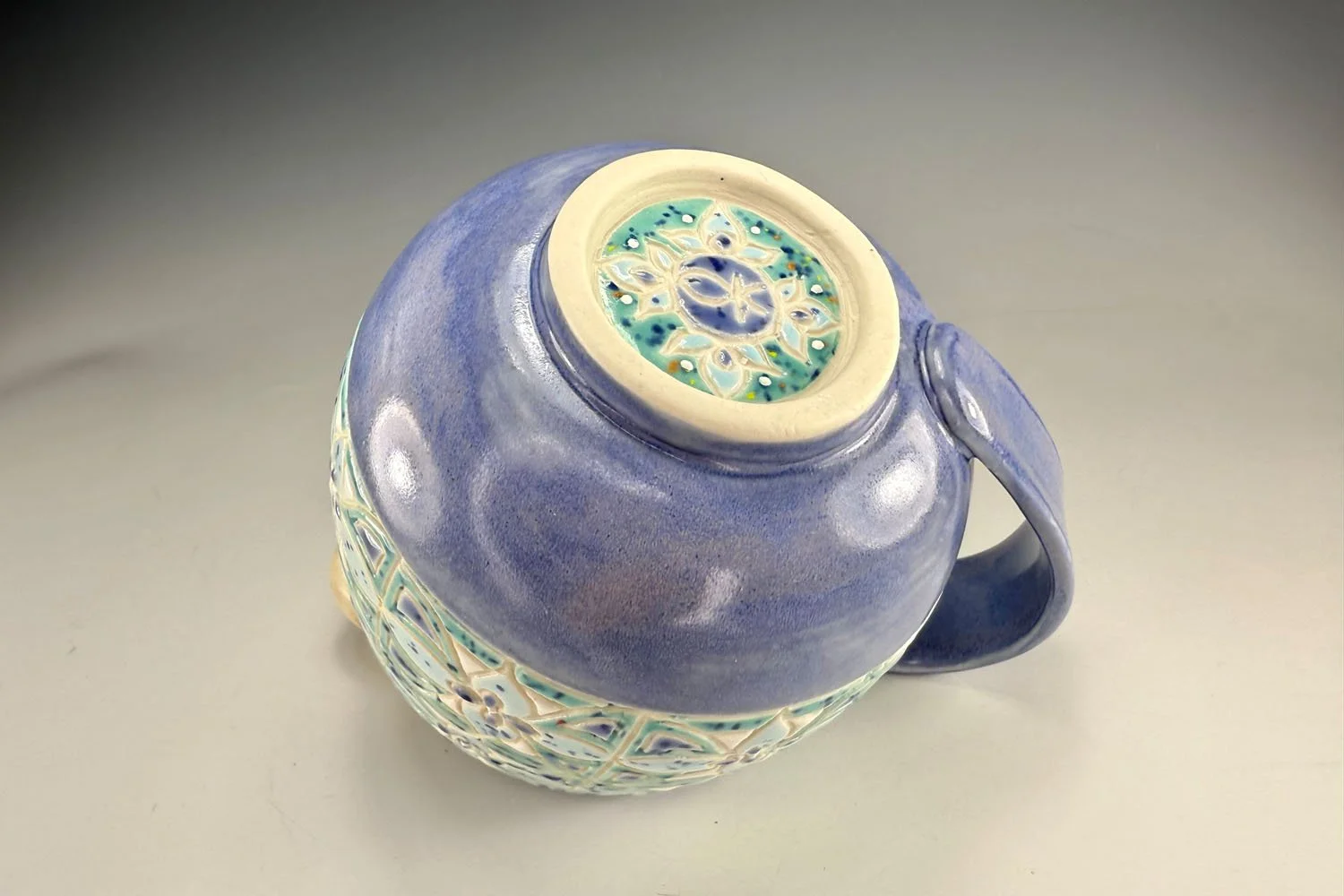 Bottom of Misty blue carved porcelain mug