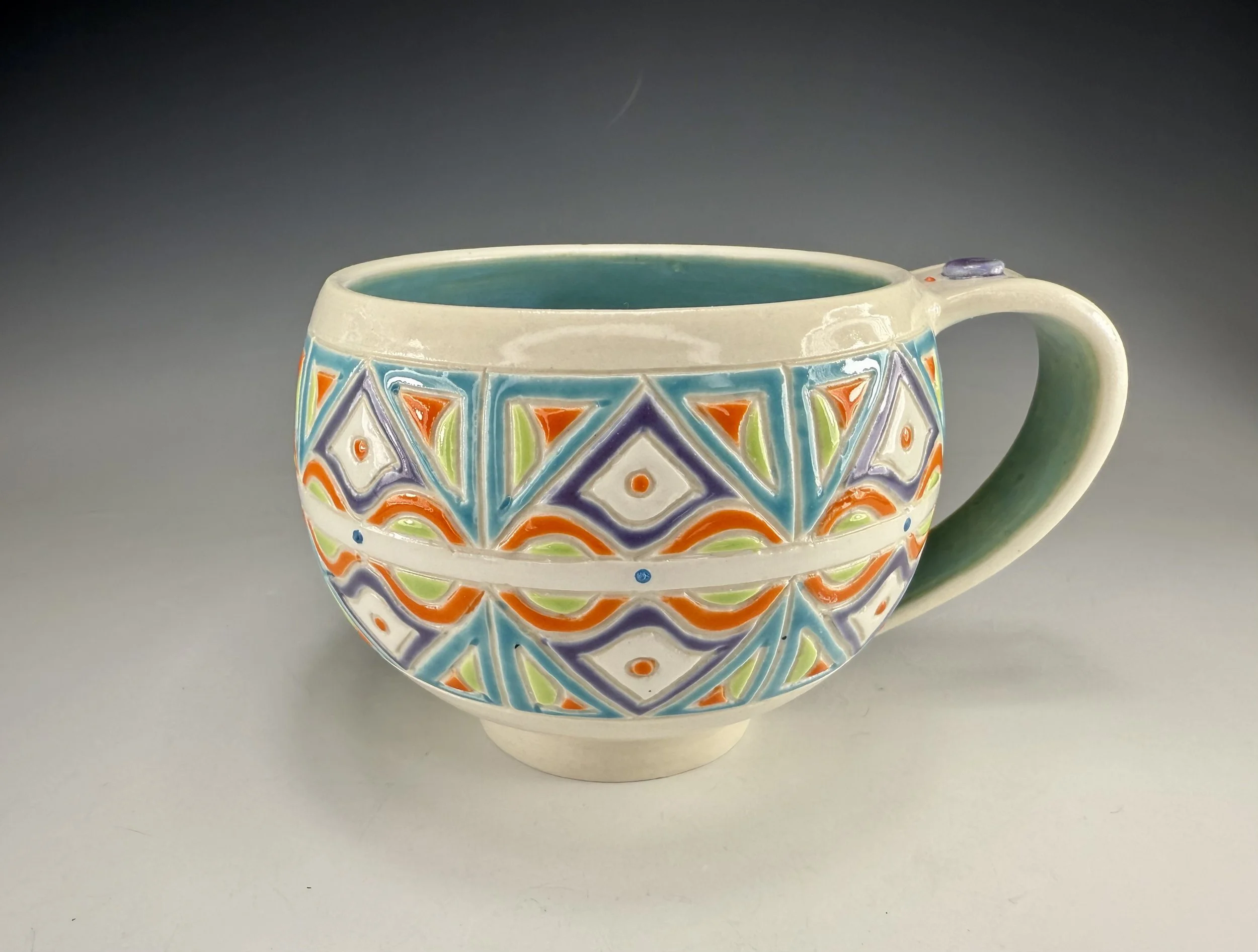 Aqua blue lime and orange porcelain mug