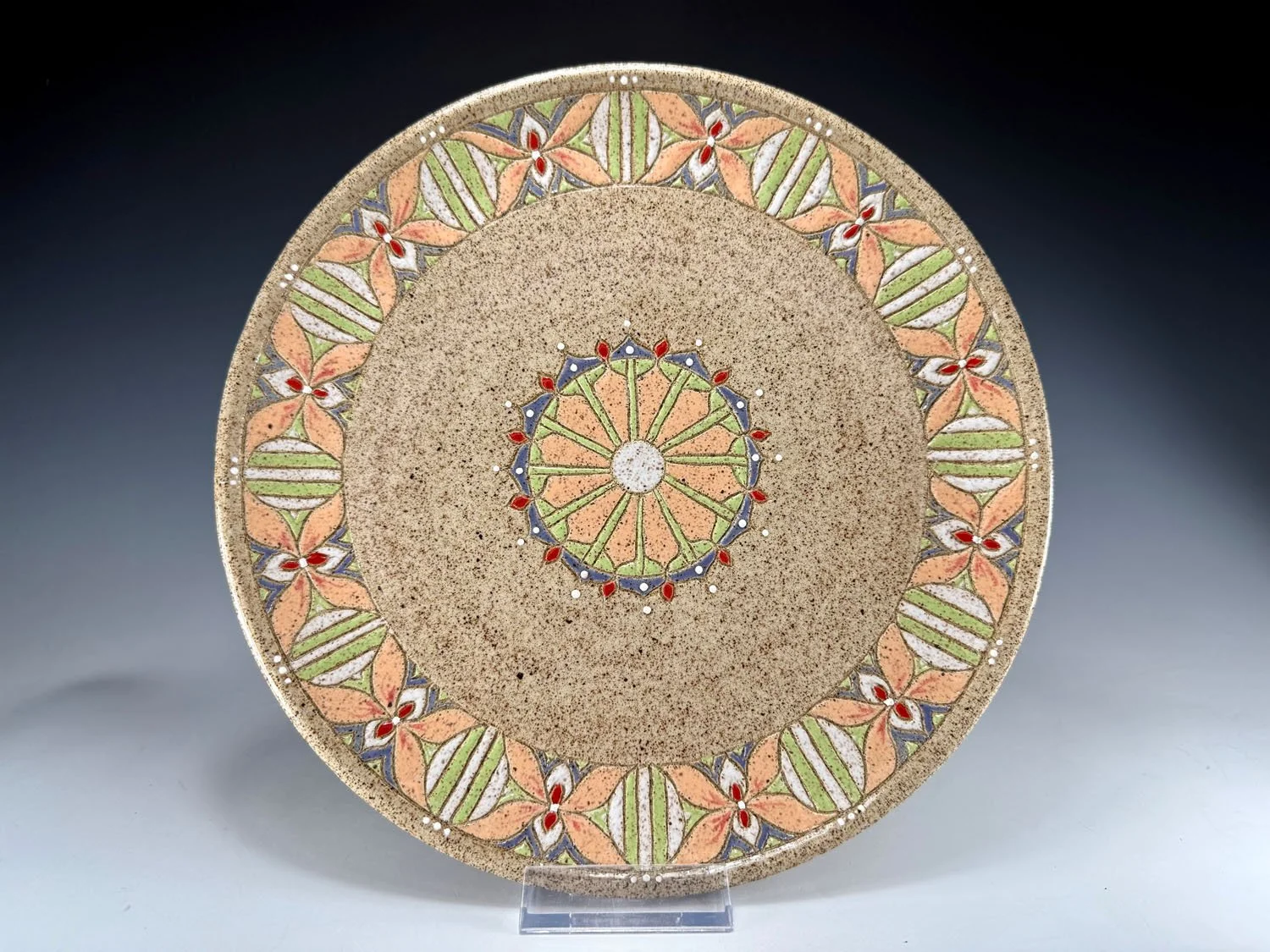 Carved stoneware serving plate