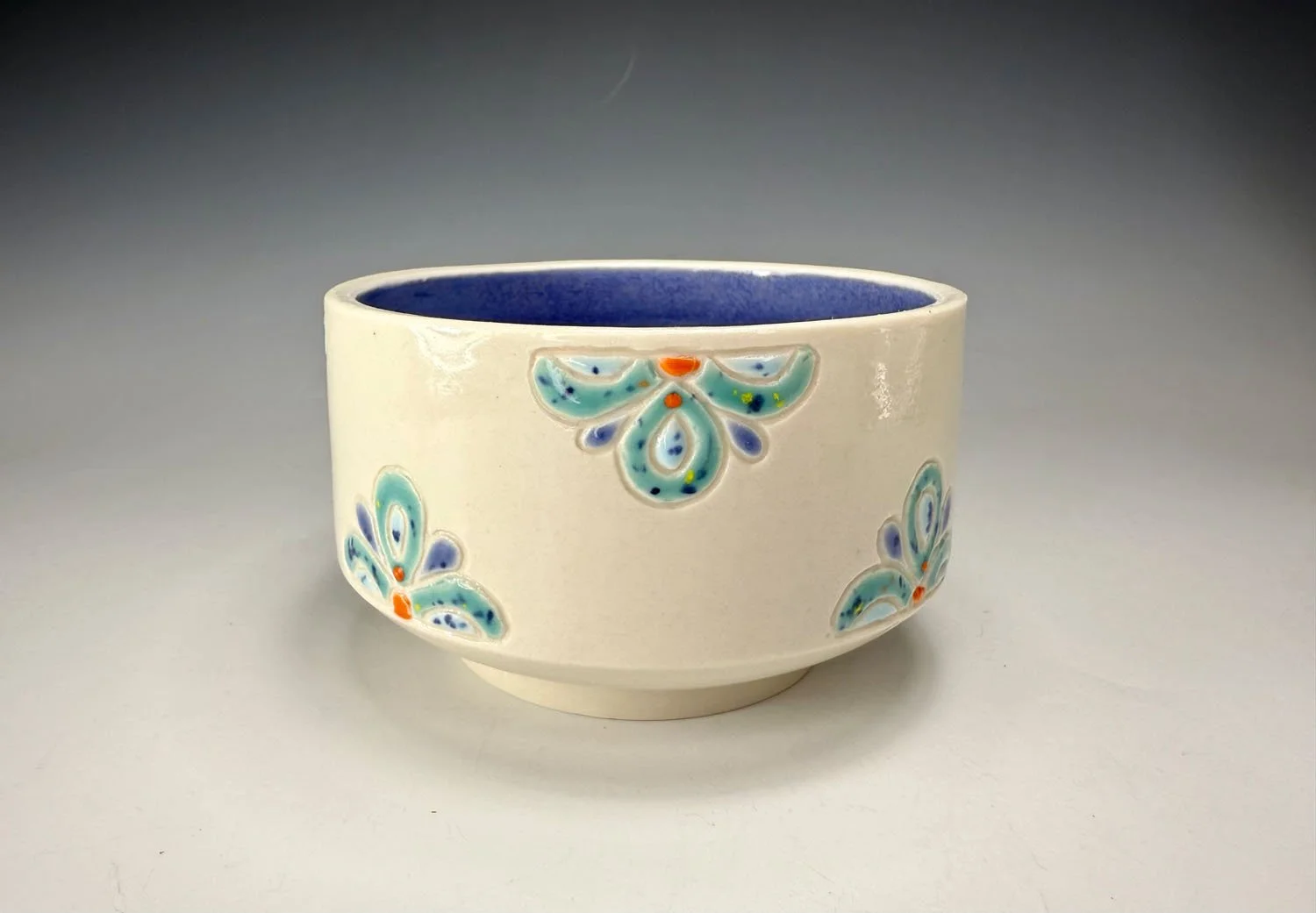 Side view of Porcelain carved snack bowl