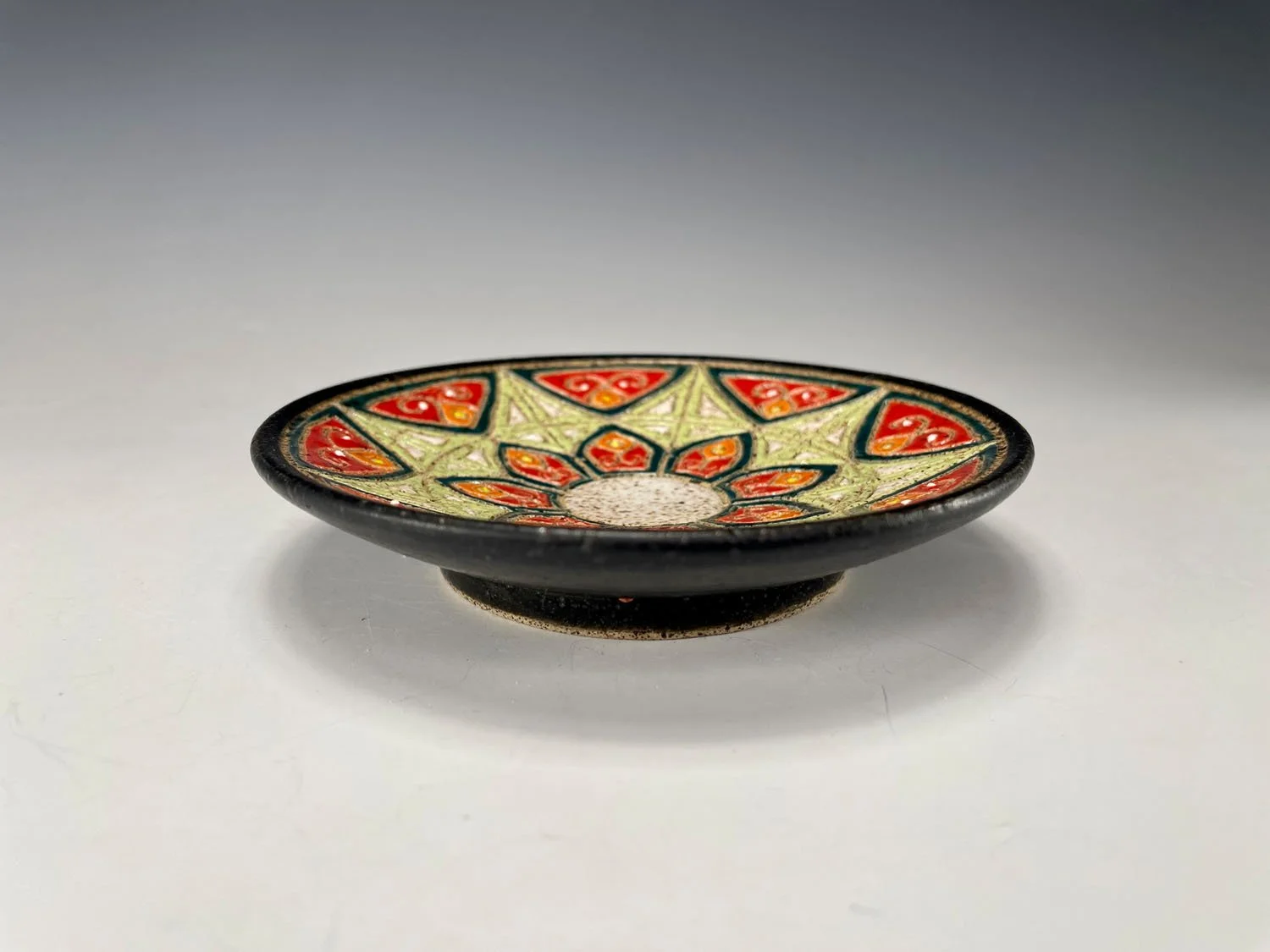 Side view of Ancient stoneware trinket dish