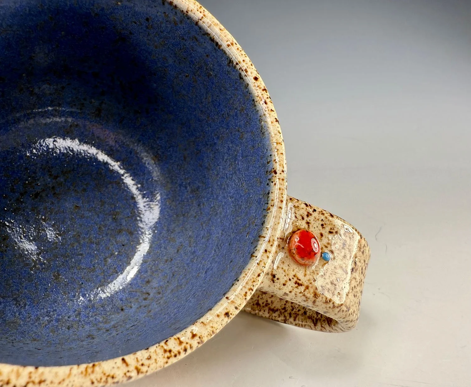 Interior of Carved stoneware mug