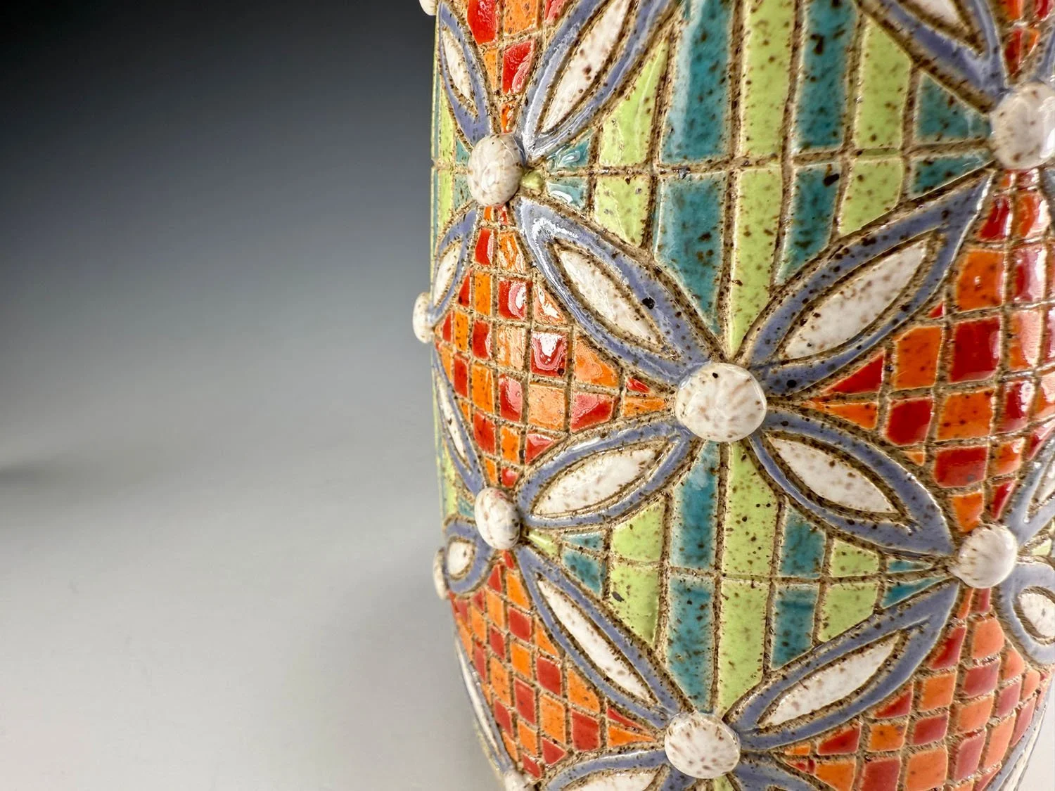 Closeup design on Checkered stripe stoneware vase
