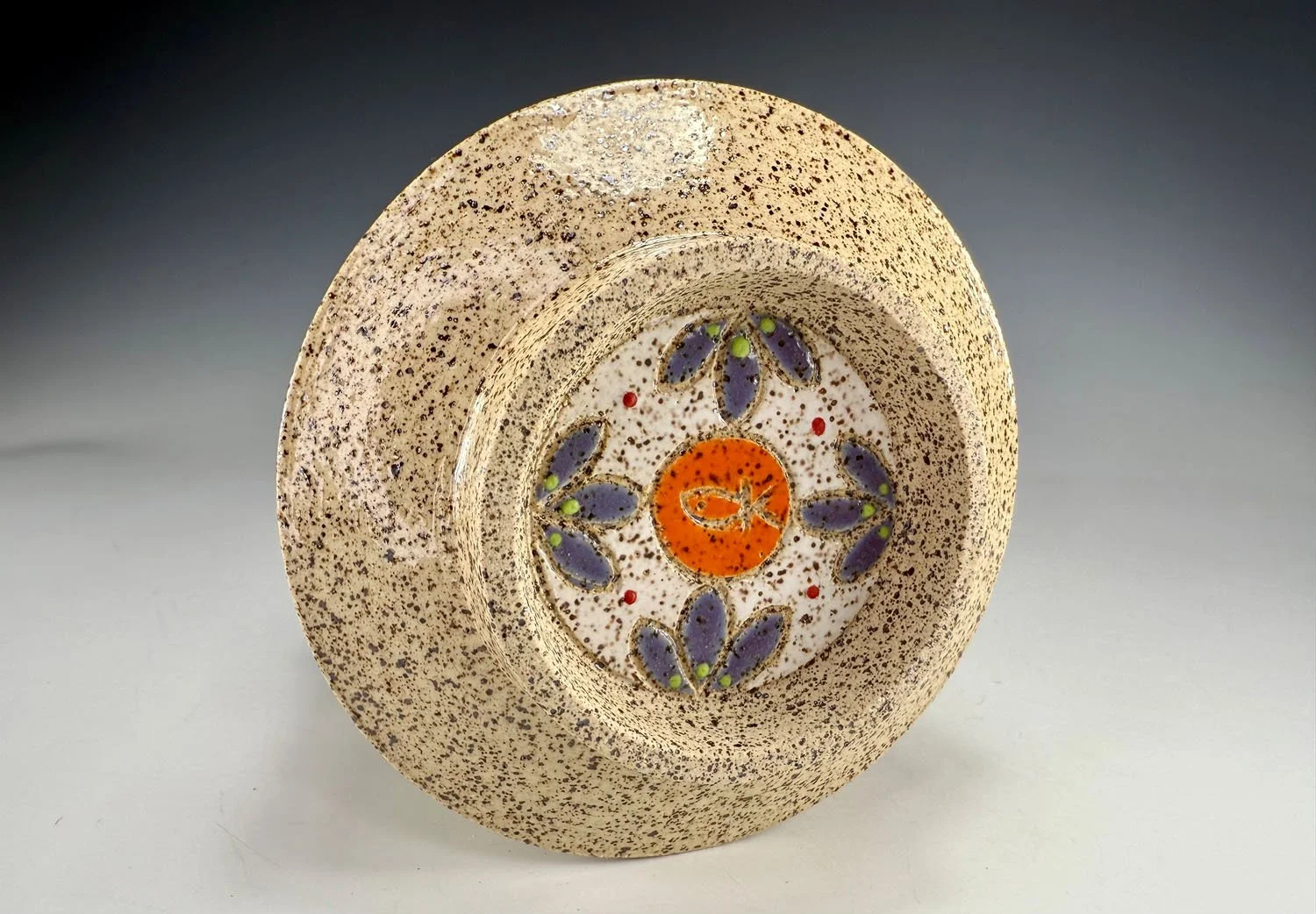 Bottom of Carved small stoneware bowl