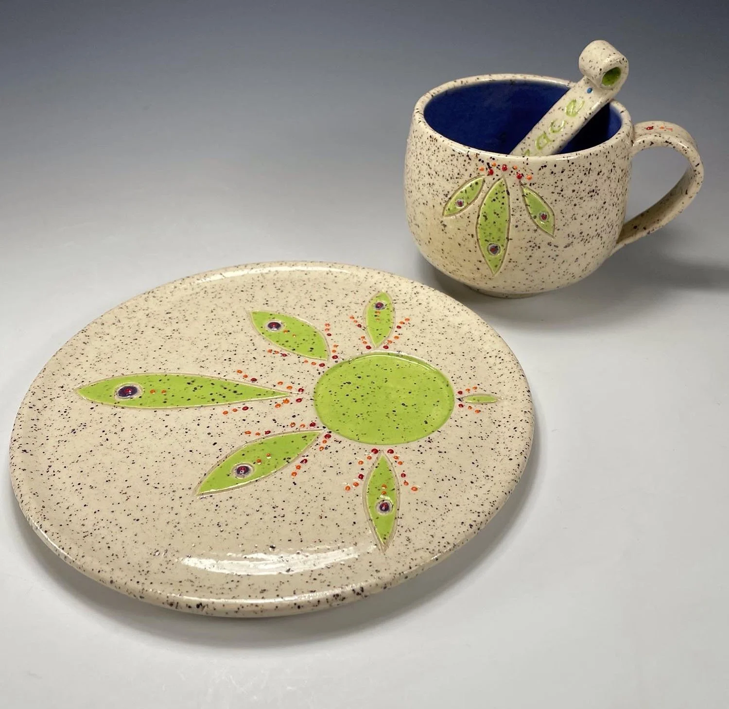 Saucer cup w spoon view of Peace cup saucer spoon stoneware set
