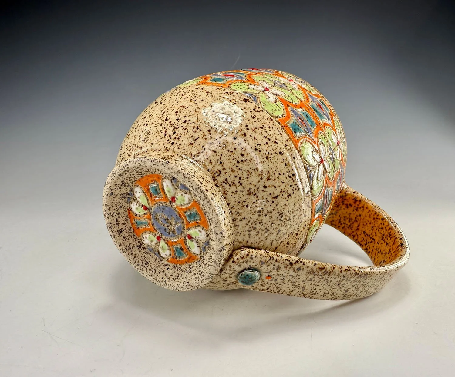 Bottom of Colorful carved stoneware mug