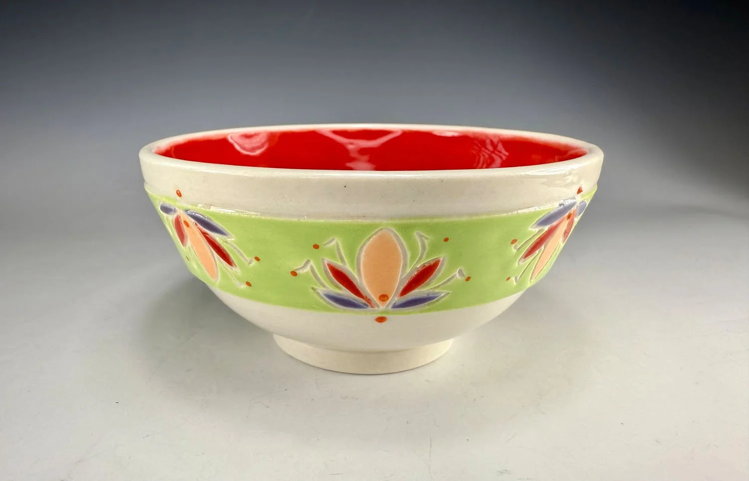 Bowl 1 of Porcelain 2 bowl snack set w red liner and carved outer designs