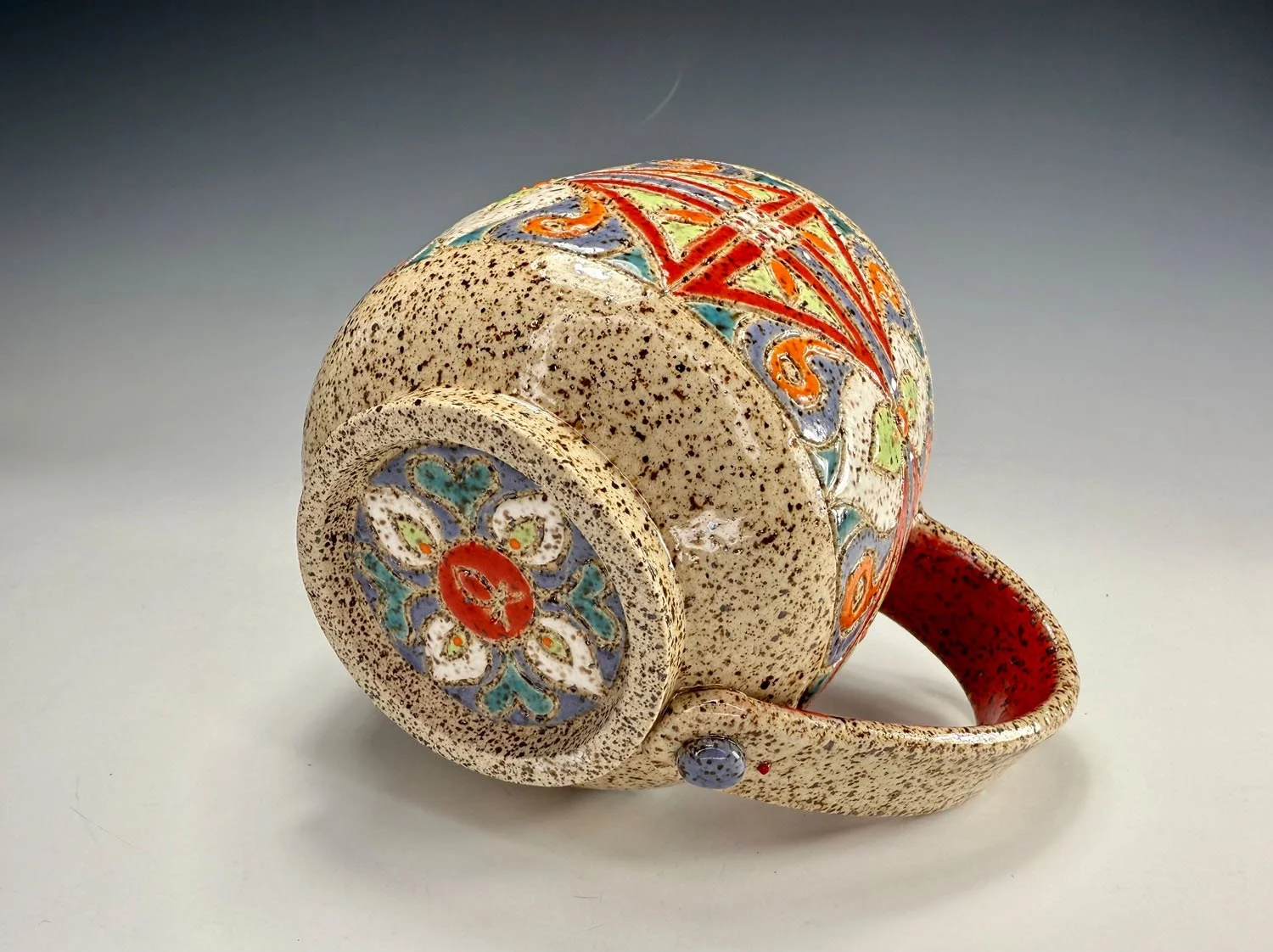 Bottom of Colorful carved stoneware mug