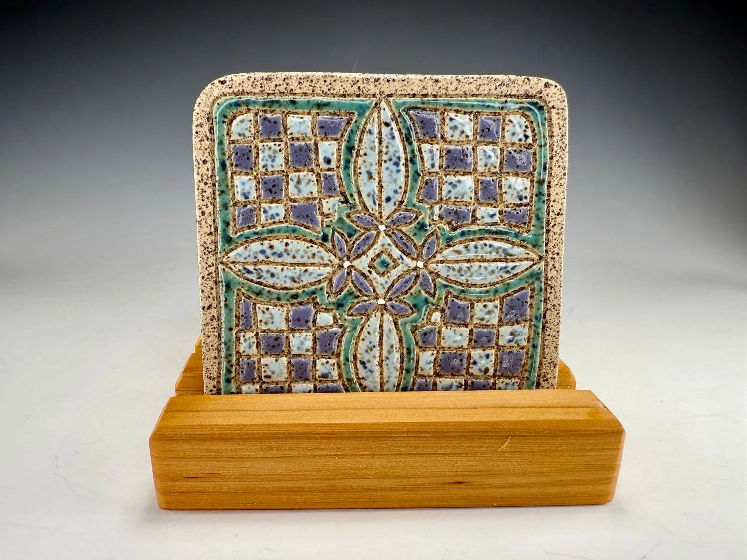 Hand carved stoneware coasters