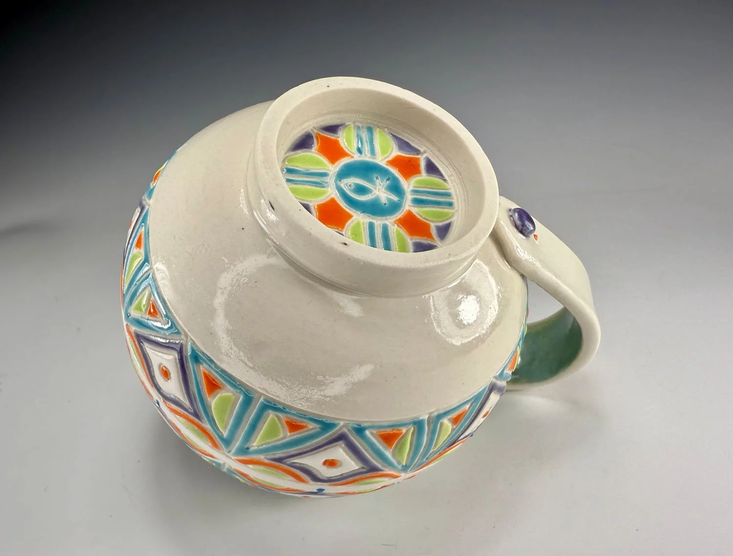Bottom of Aqua blue lime and orange porcelain mug