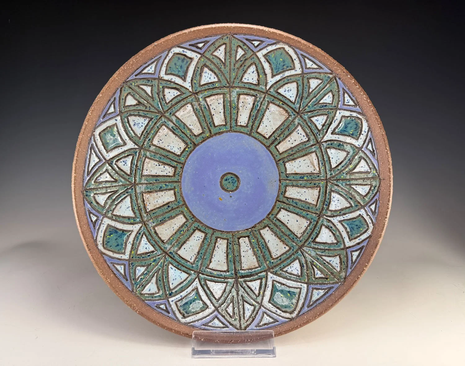 Blue green carved red stoneware serving bowl