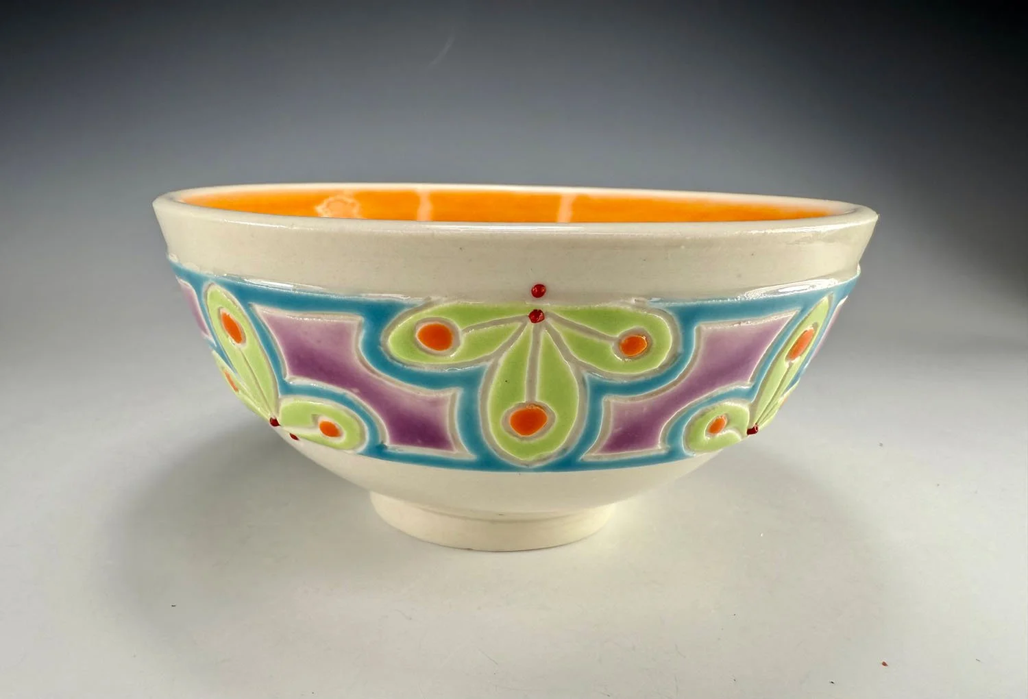 Bowl 2 of Tangerine lined porcelain two bowl snack set with carved outer bands