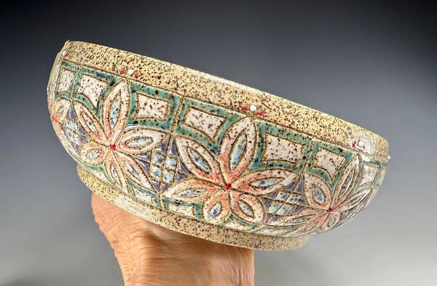Hand holding Stoneware serving bowl