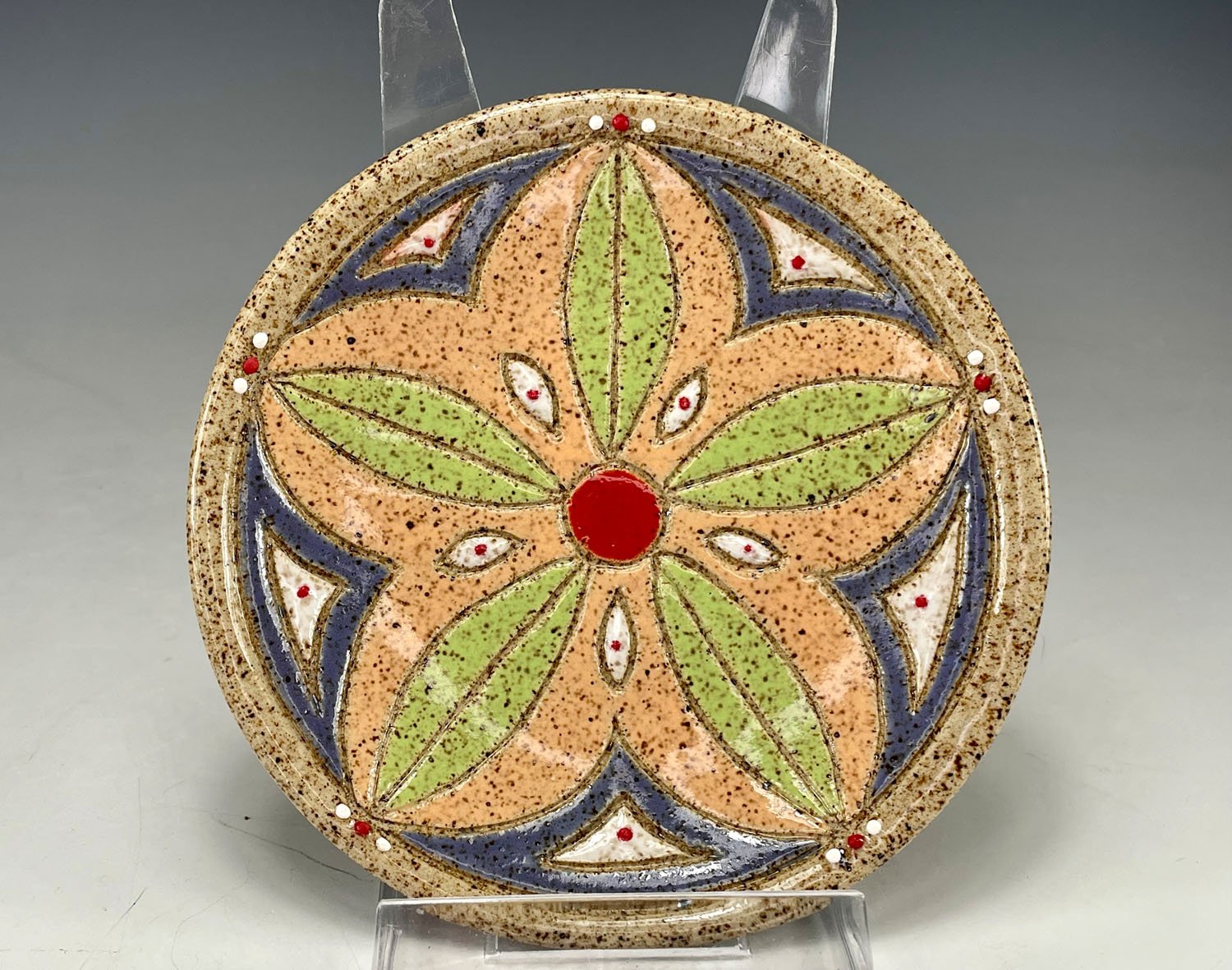 Carved seeds stoneware trinket dish