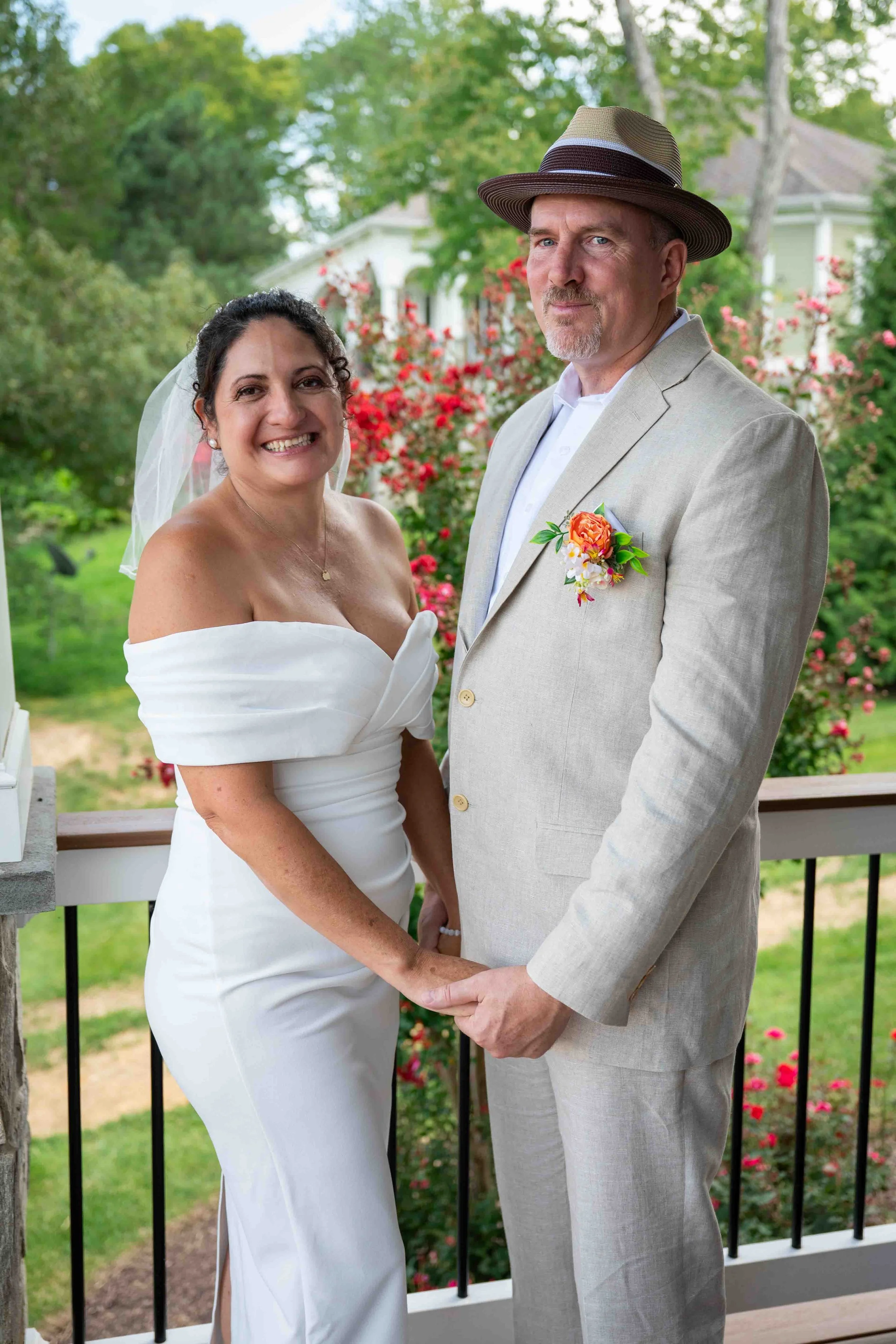 Bride and groom in Virginia posing in wedding attire
