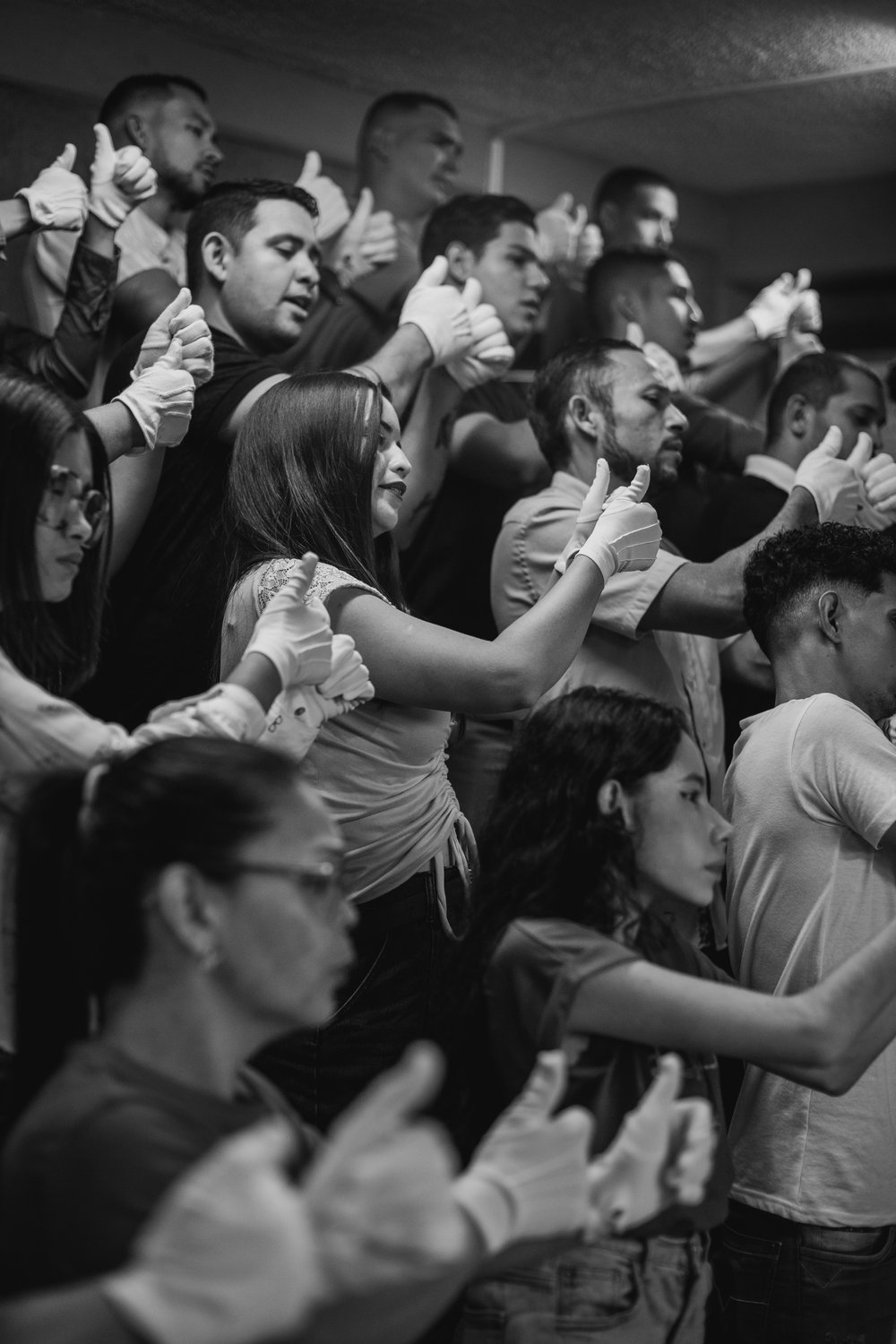 Jennifer González (center) and members of the Deaf section of the White Hands Choir (El Coro de Manos Blancas) rehearse in Barquisimeto, Venezuela. February 2024. 