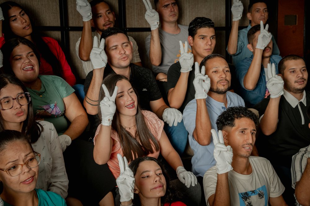Members of the Deaf section of the White Hands Choir (El Coro de Manos Blancas) rehearse in Barquisimeto, Venezuela. February 2024.