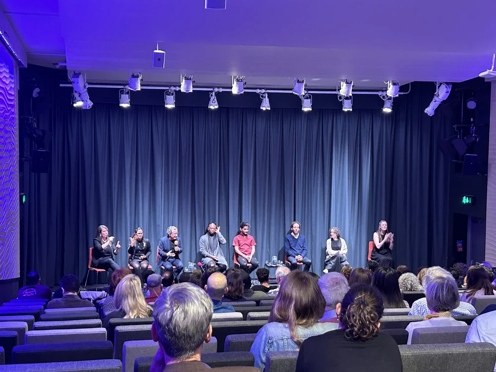 The cast of Fidelio, Deaf West Theatre, Coro de Manos Blancas, and Deaf community members from the UK meet at the Barbican Centre, June 2024.