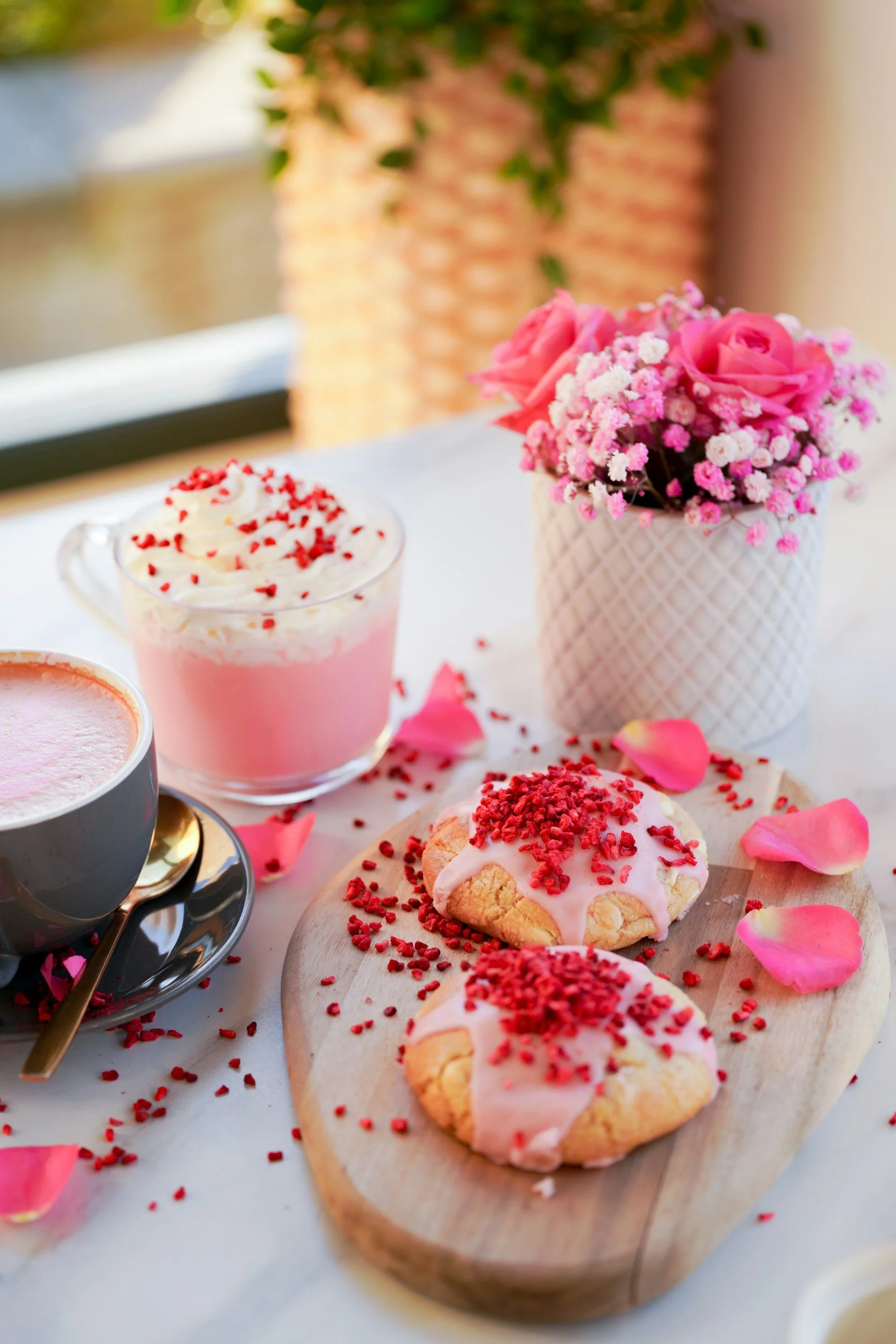 Pink frosted cupcakes and coffee mug representing burnout recovery and rediscovering joy.