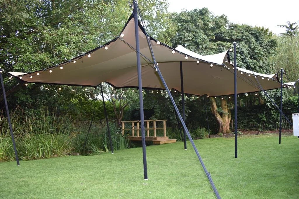 Stretch tents
Event tents
Outdoor tents
Flexible tent structures
Tensile fabric structures
Stretch fabric canopies
Weather-resistant tents
Customized stretch shelters
Portable stretch marquees
Pop-up event tents
Stretch tent rentals
Wedding tent solu