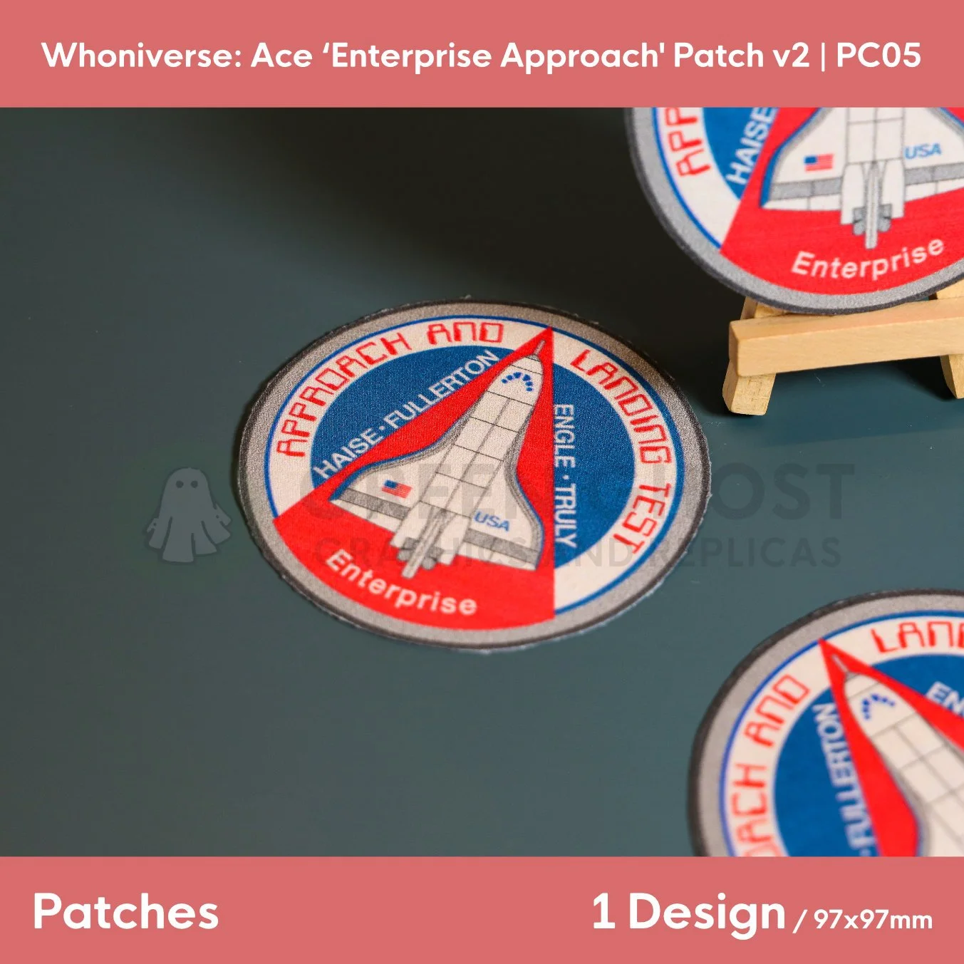 Close up of the finished version of the Approach patch design, on a plain aqua green background.