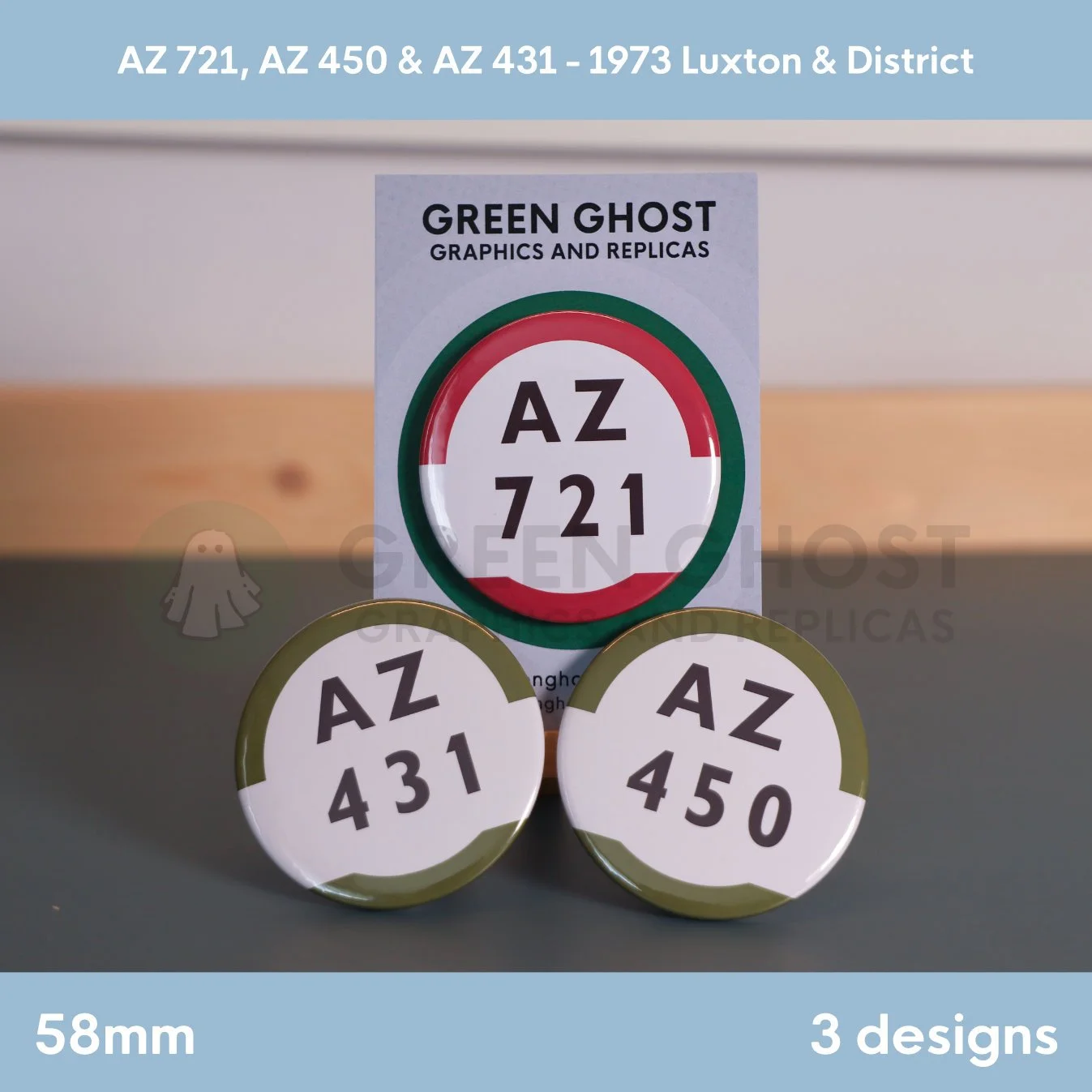 Three round white badges with bold black route codes and coloured borders arranged on a flat surface with a branded card behind them.